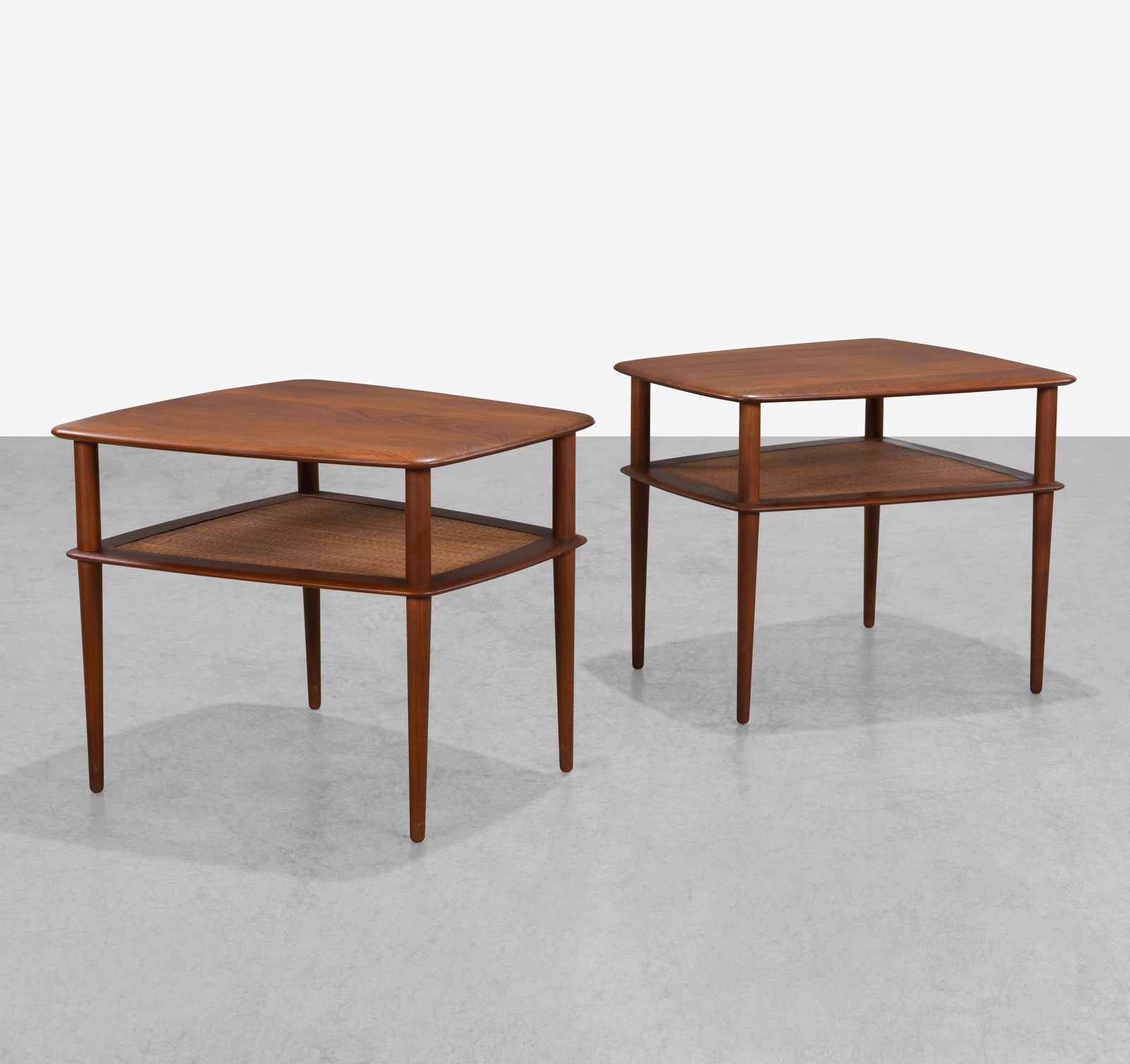 Peter Hvidt - End Tables: A pair of teak and cane end tables by Peter Hvidt. All measurements are in inches. Height x Width x Depth