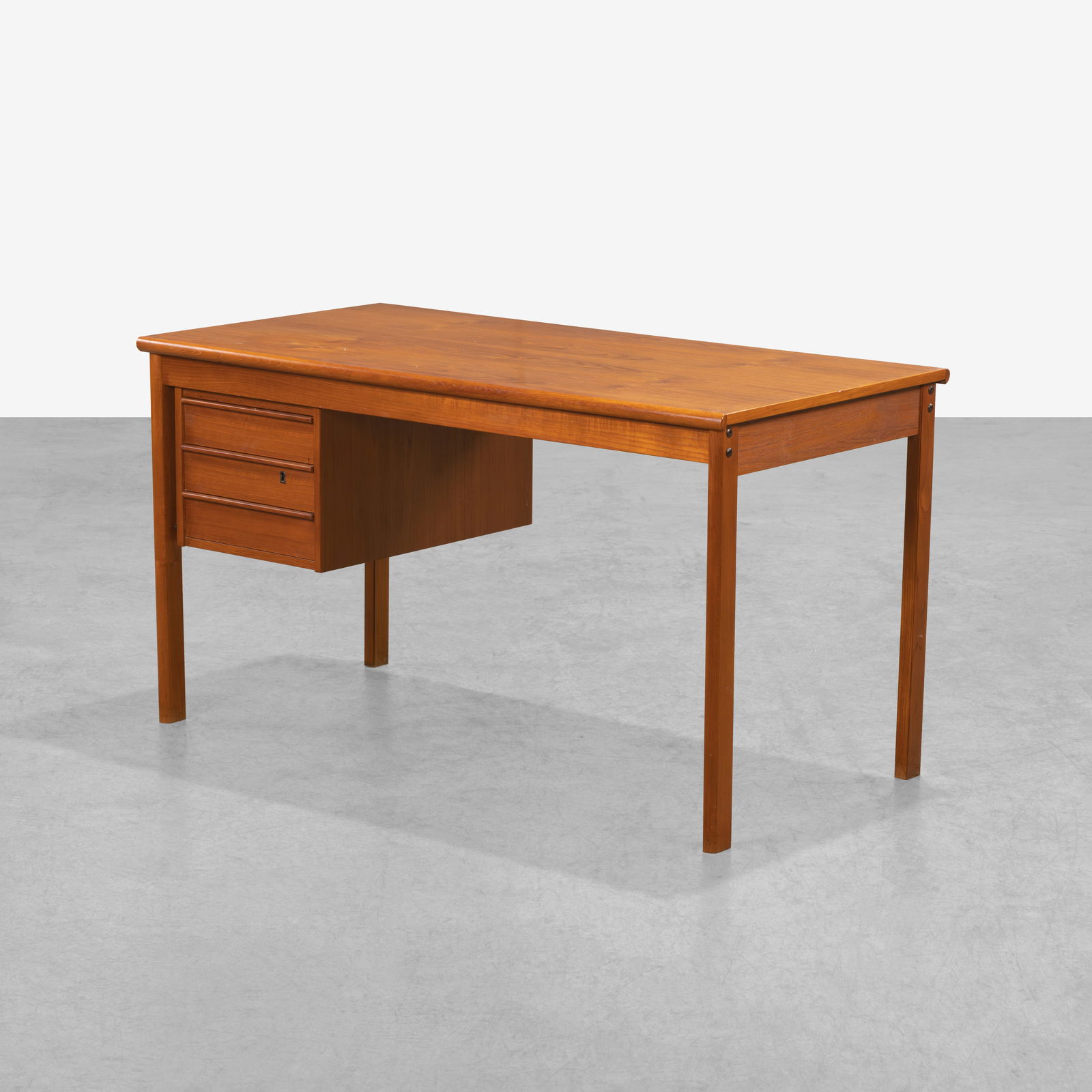 Peter Lovig-Nielsen - Desk: A teak desk by Peter Lovig-Nielsen with sliding top. All measurements are in inches. Height x Width x Depth
