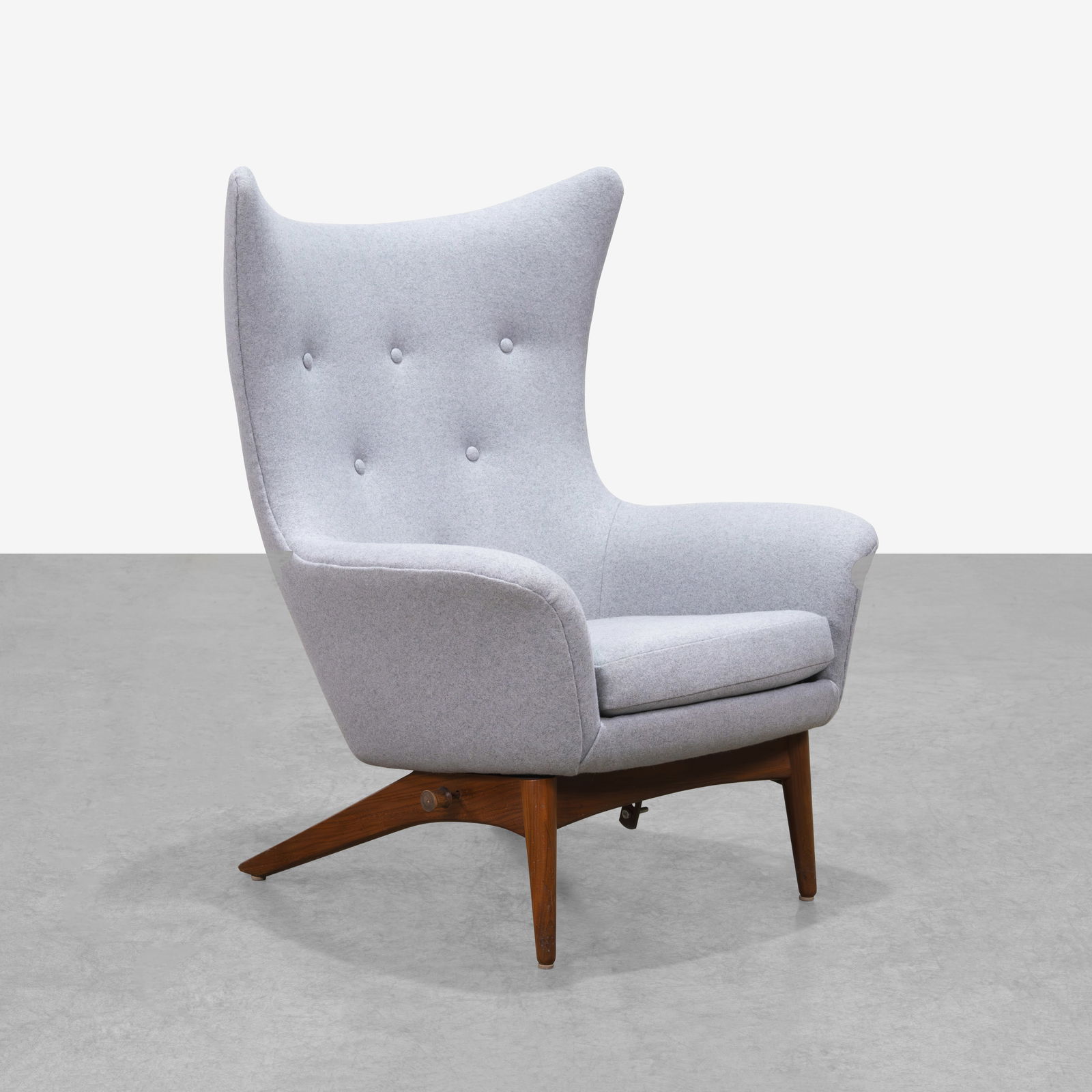 H. W. Klein - Lounge Chair: A rocking lounge chair on walnut base by H. W. Klein with wool upholstery. All measurements are in inches. Height x Width x Depth