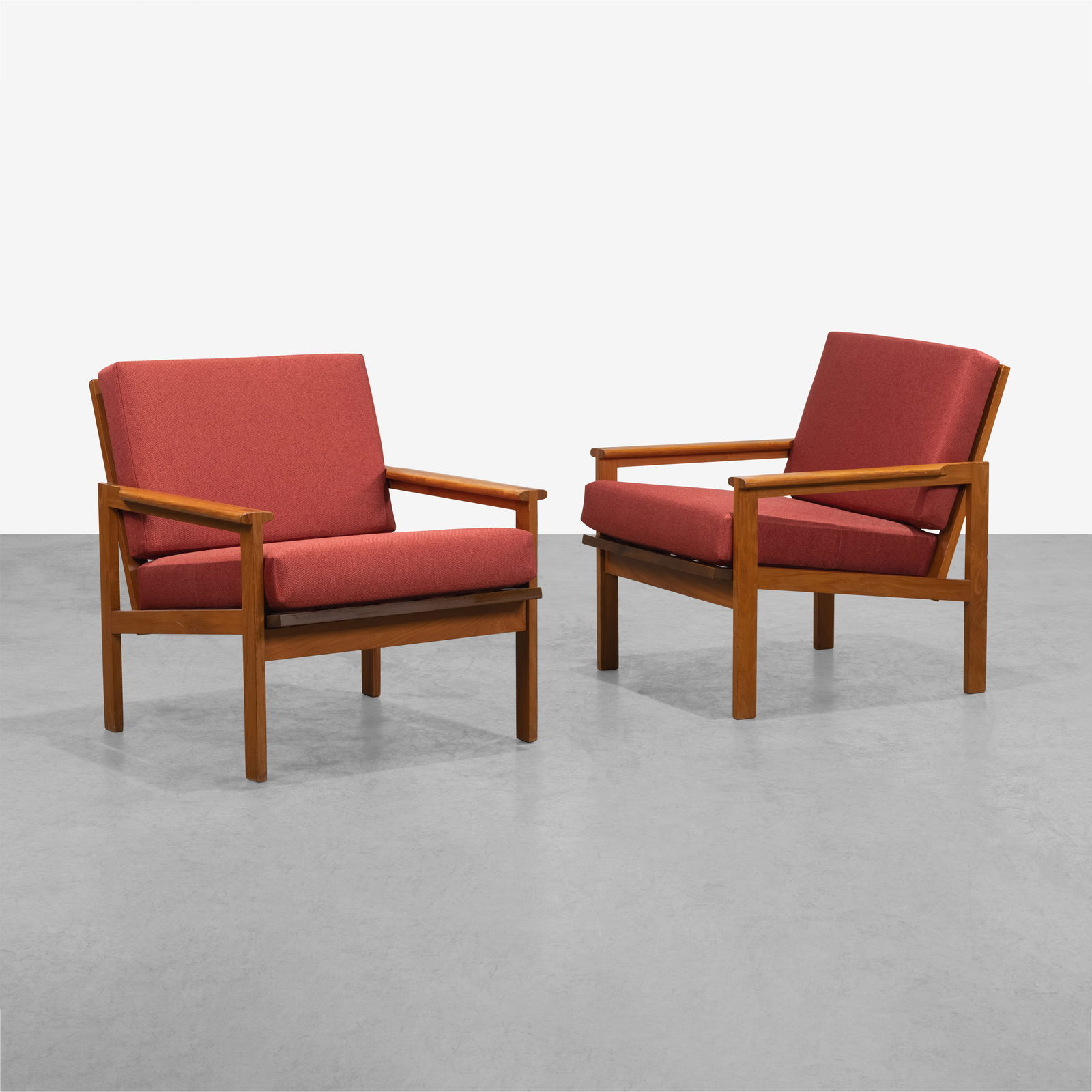 Illum Wikkelso - Lounge Chairs: A pair of teak 'Capella" lounge chairs by Illum Wikkelso for Niels Eilersen. All measurements are in inches. Height x Width x Depth