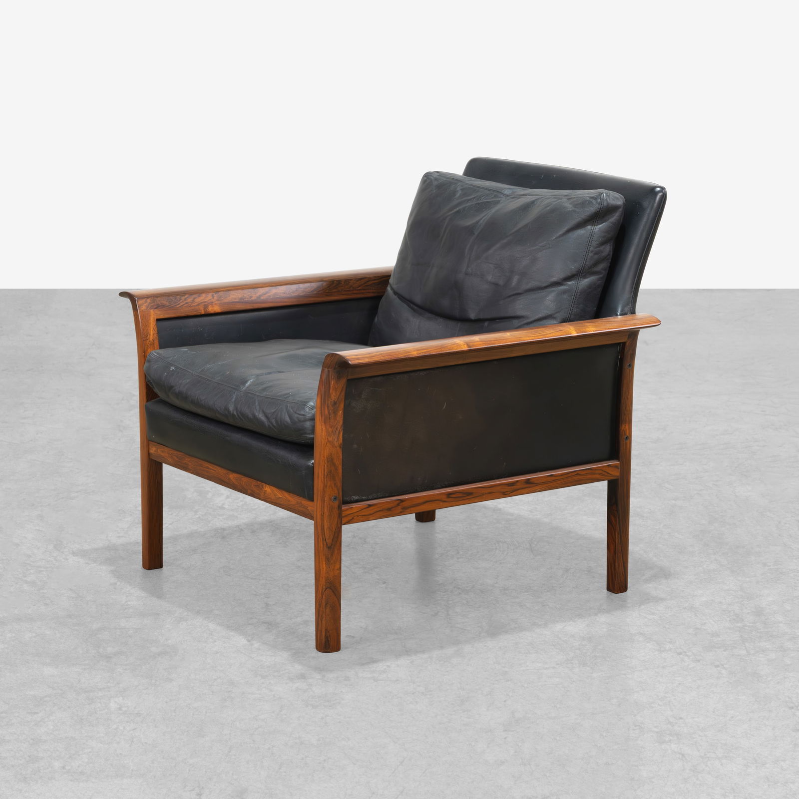 Knut Saeter - Lounge Chair: A rosewood and leather lounge chair by Knut Saeter for Vatne, Mobler. All measurements are in inches. Height x Width x Depth