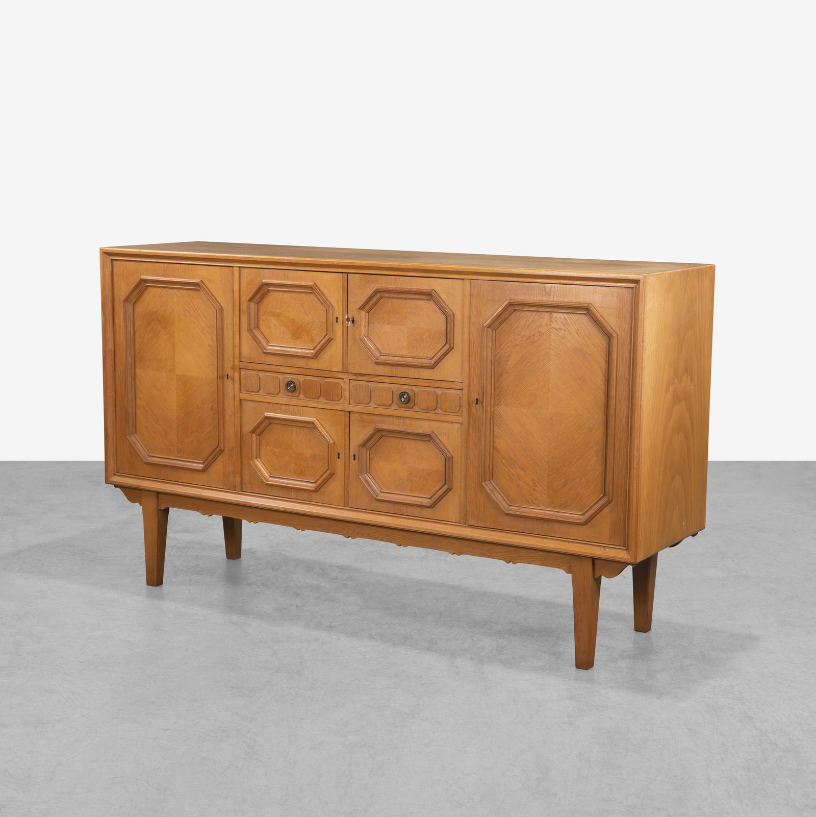 Henning Kjaernulf (Attr.) - Sideboard: An oak sideboard attributed to Henning Kjaernulf. All measurements are in inches. Height x Width x Depth