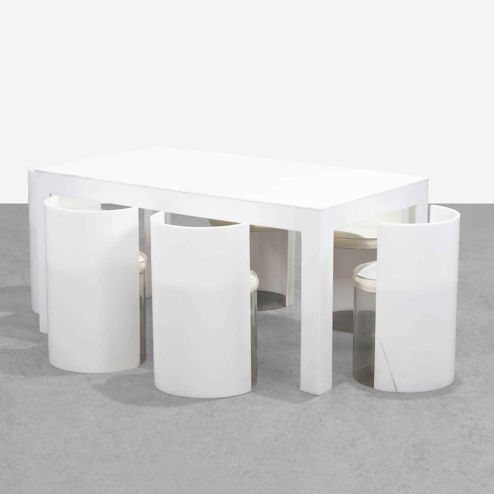 Space Age Dining Set: A seven piece acrylic dining set. Includes six acrylic tub chairs and dining table. Chairs - 26.75 x 16.5 x 16.5. All measurements are in inches. Height x Width x Depth