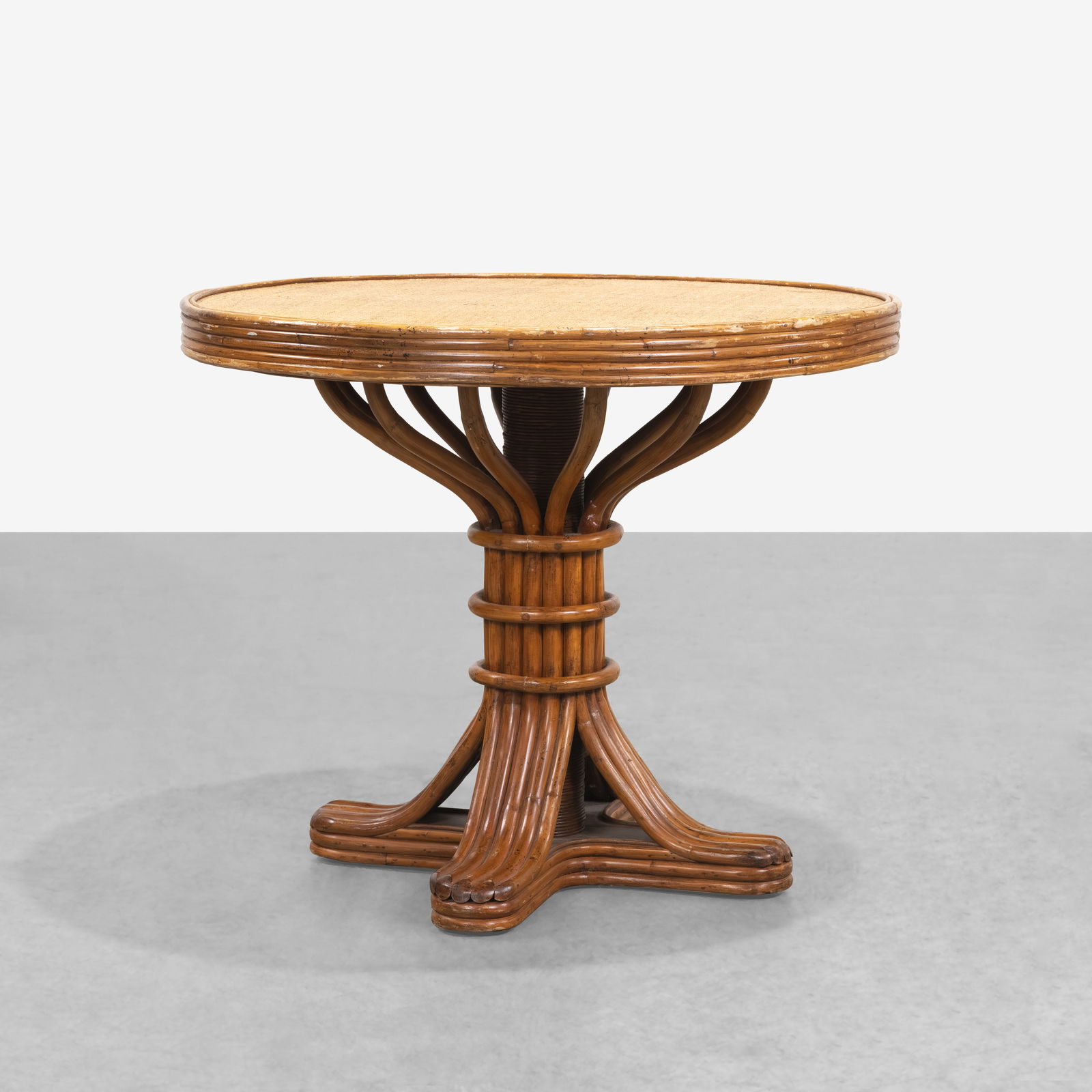 Rattan Center Table: A rattan center table. All measurements are in inches. Height x Width x Depth