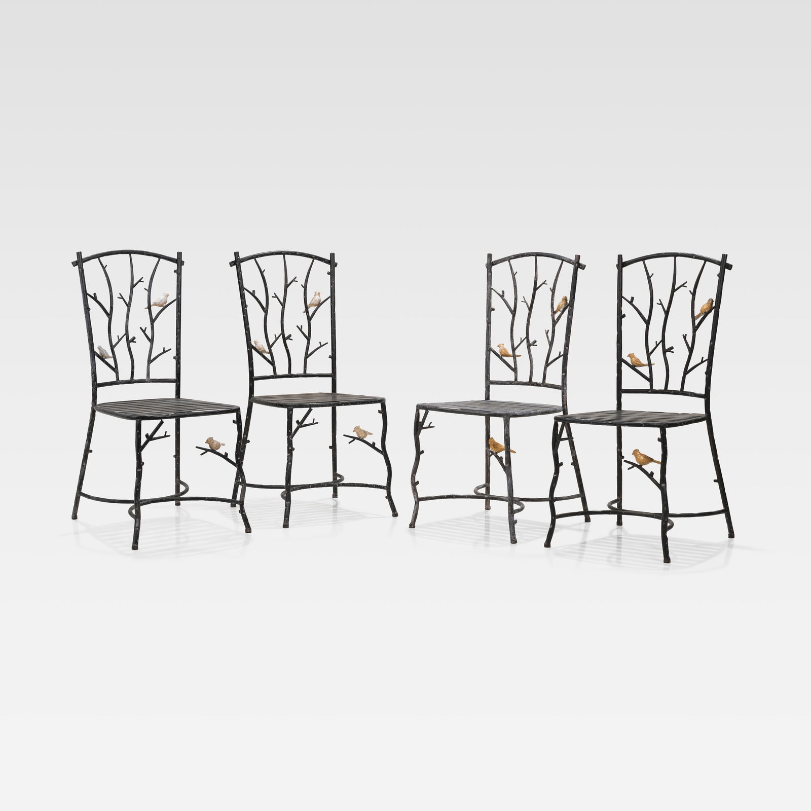 Faux Bois Metal Bird Chairs: A set of four faux bois metal bird chairs. All measurements are in inches. Height x Width x Depth