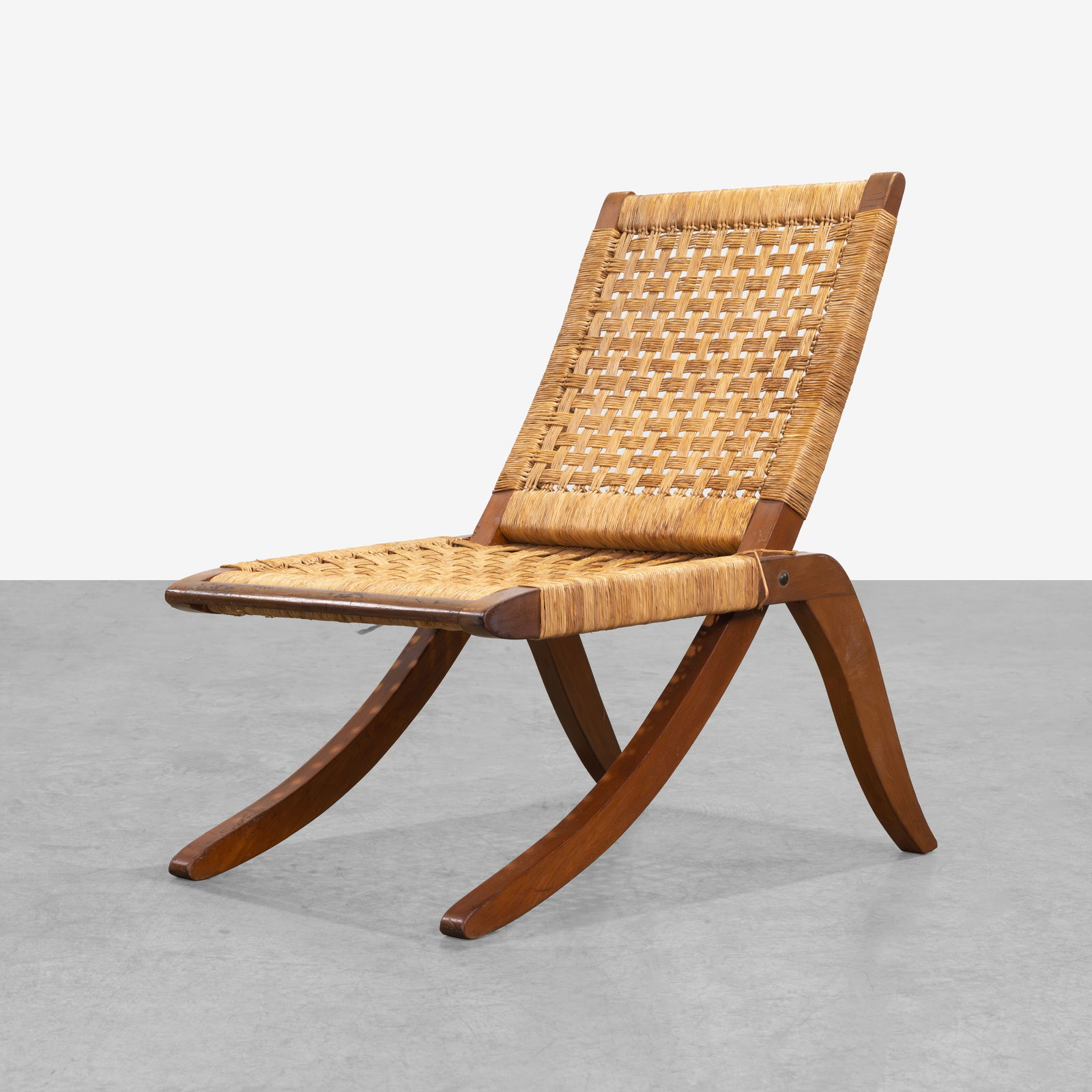 Vintage Folding Chair: A vintage Mexican folding chair with rope woven cord seat and backrest. All measurements are in inches. Height x Width x Depth