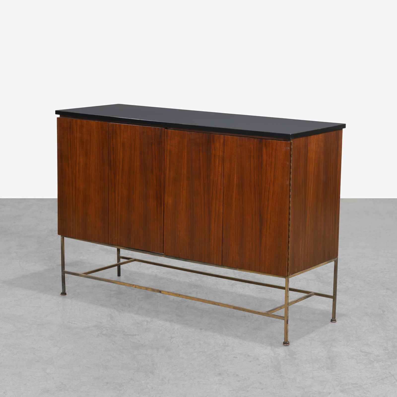 Paul McCobb - Server: A Paul McCobb server on a brass base with finished back for Calvin. All measurements are in inches. Height x Width x Depth