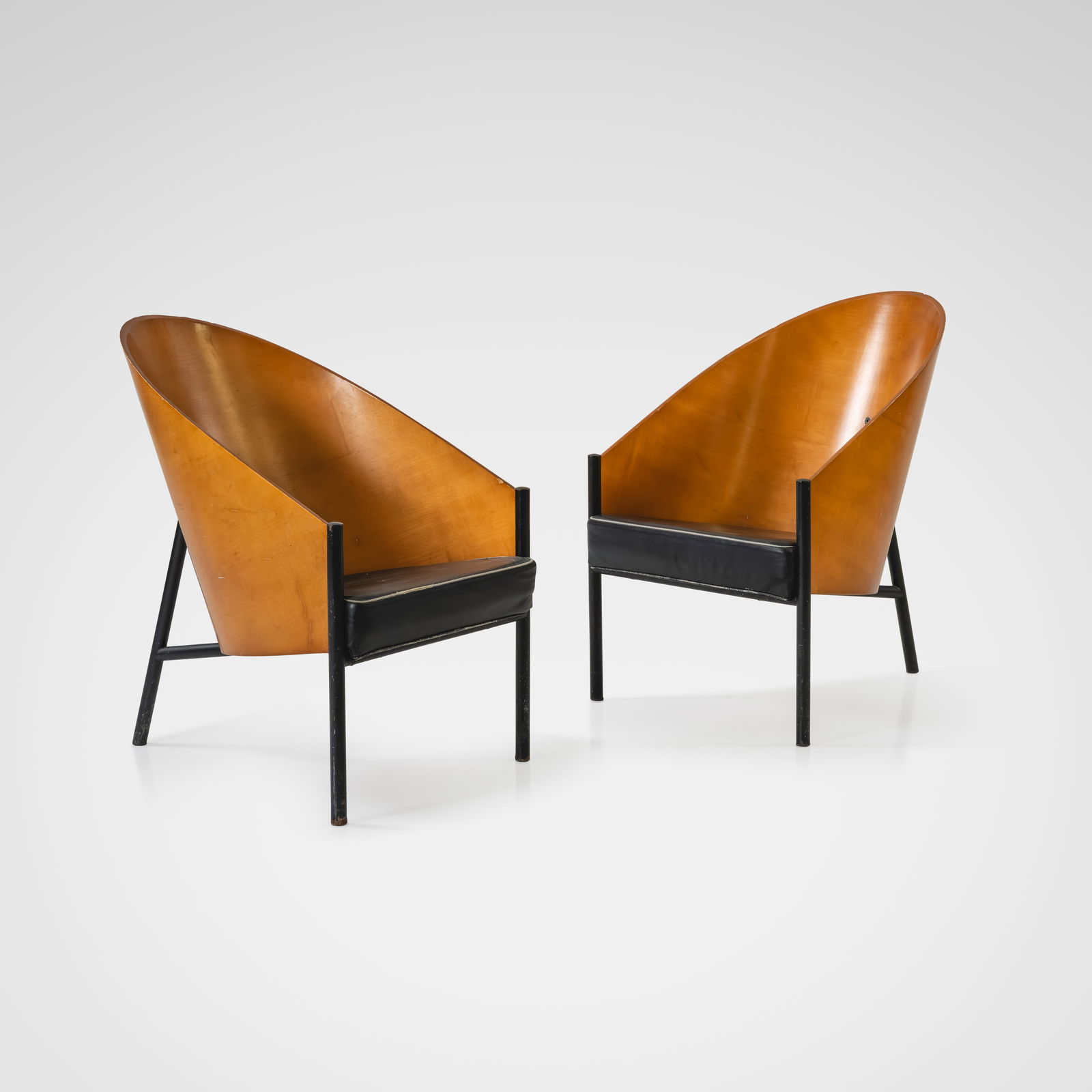 Philippe Starck - Lounge Chairs: A pair of 'Pratfall' lounge chairs by Philippe Starck. All measurements are in inches. Height x Width x Depth