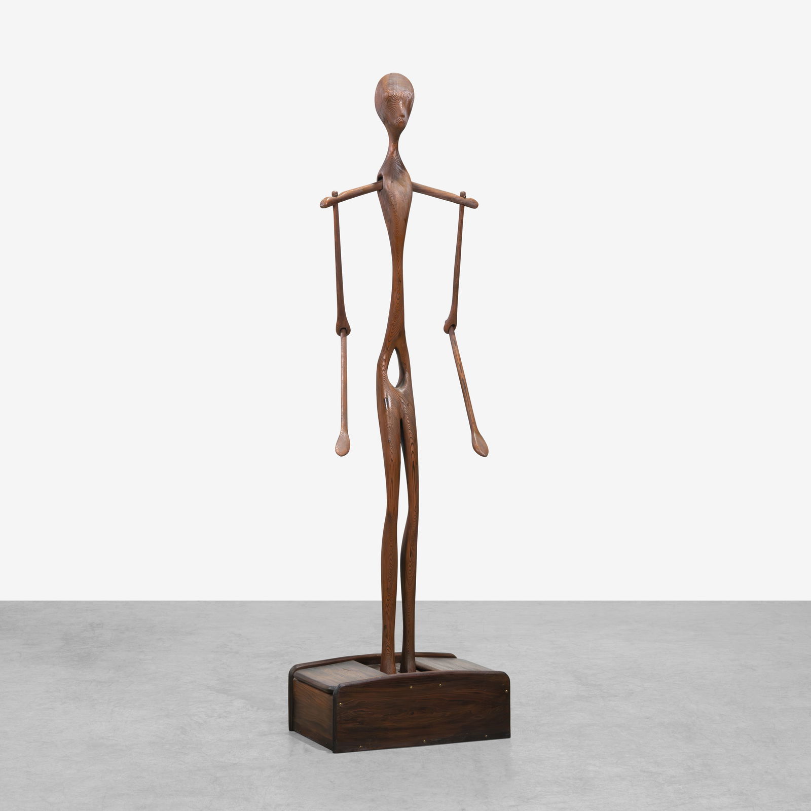 Folk Art Sculpture: A life-sized carved wooden figural sculpture on box. All measurements are in inches. Height x Width x Depth