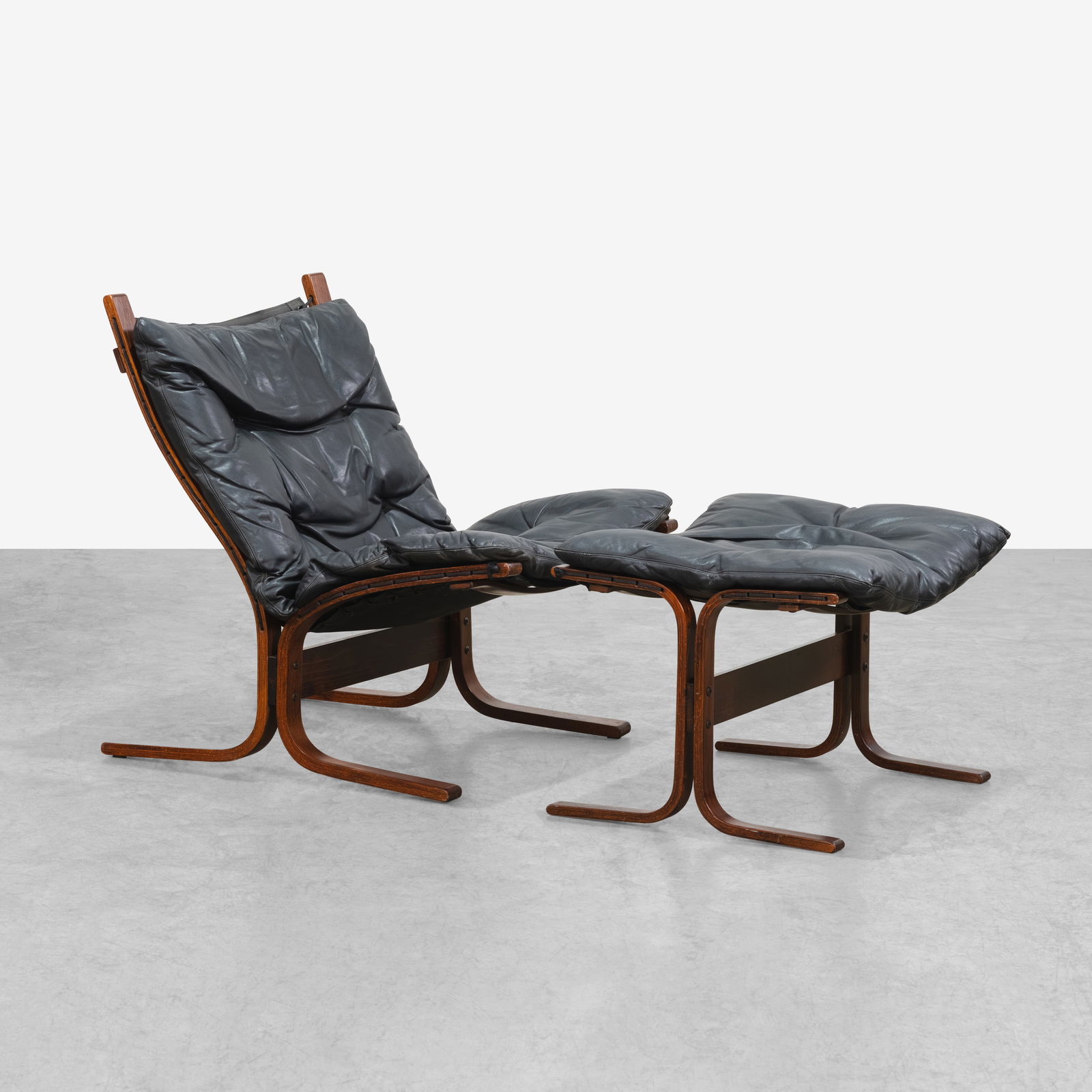 Ingmar Relling - Chair & Ottoman: A leather and rosewood 'Siesta' chair and ottoman by Ingmar Relling for Westnofa, Norway. Dimensions listed are for the chair. Ottoman - 17.5 x 25 x 21. All measurements are in inches. Height x Width