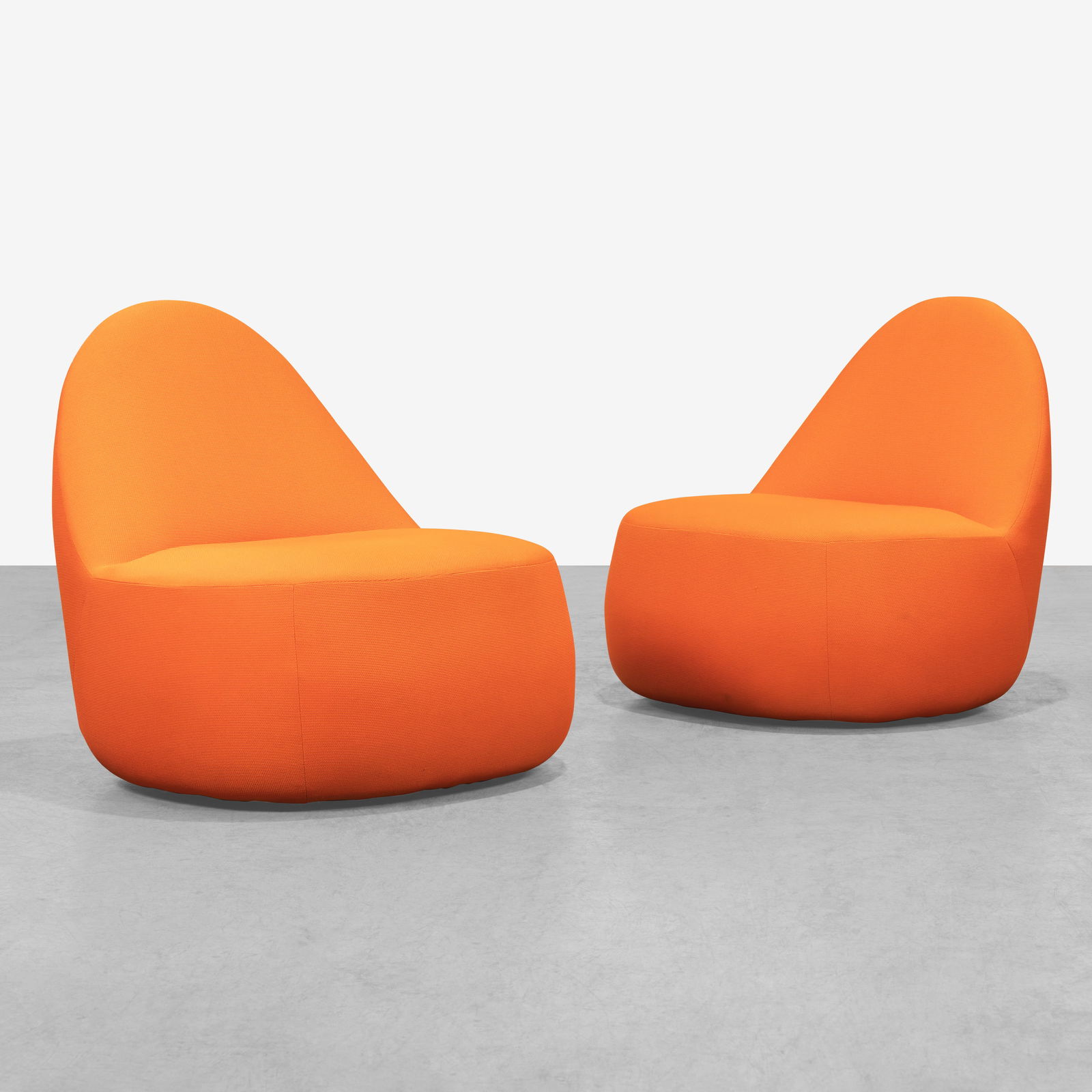 Bernhardt Design - Lounge Chairs: A pair of 'Mitt' lounge chairs on casters by Bernhardt Design. All measurements are in inches. Height x Width x Depth
