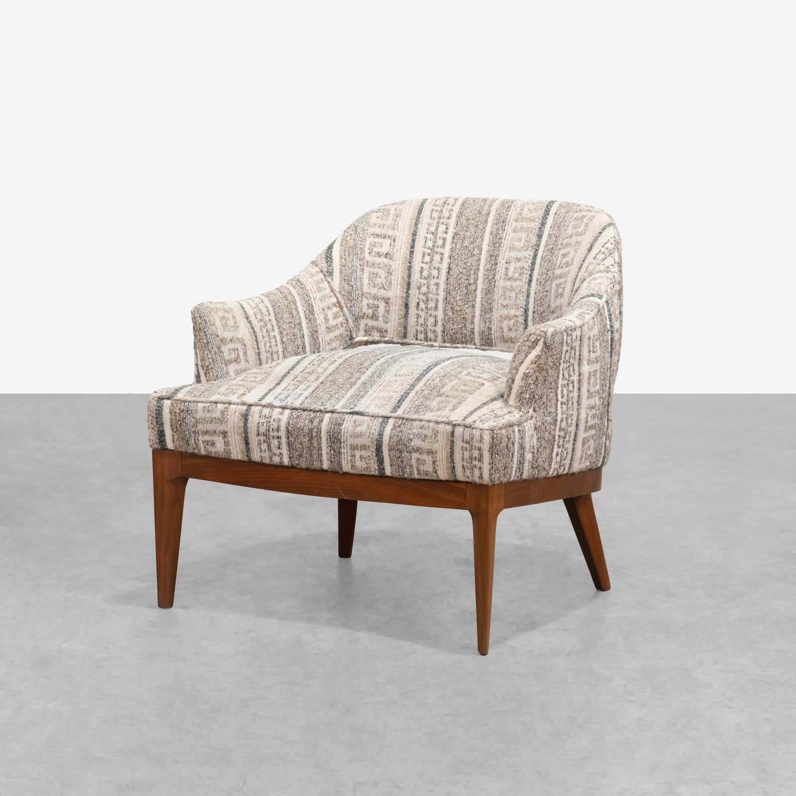 Vintage Slipper Chair: A vintage slipper chair on a walnut base by John Stewart. All measurements are in inches. Height x Width x Depth