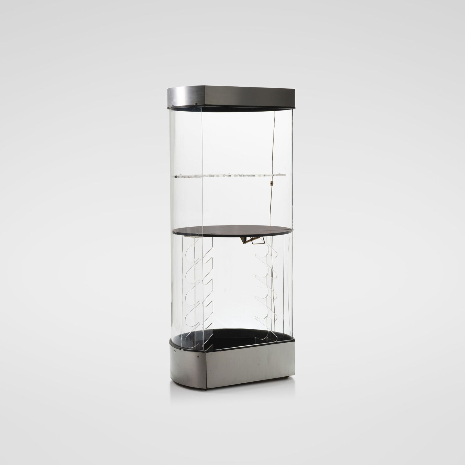 Lucite Dry Bar: A vintage bent lucite dry bar on casters with lighted interior. All measurements are in inches. Height x Width x Depth