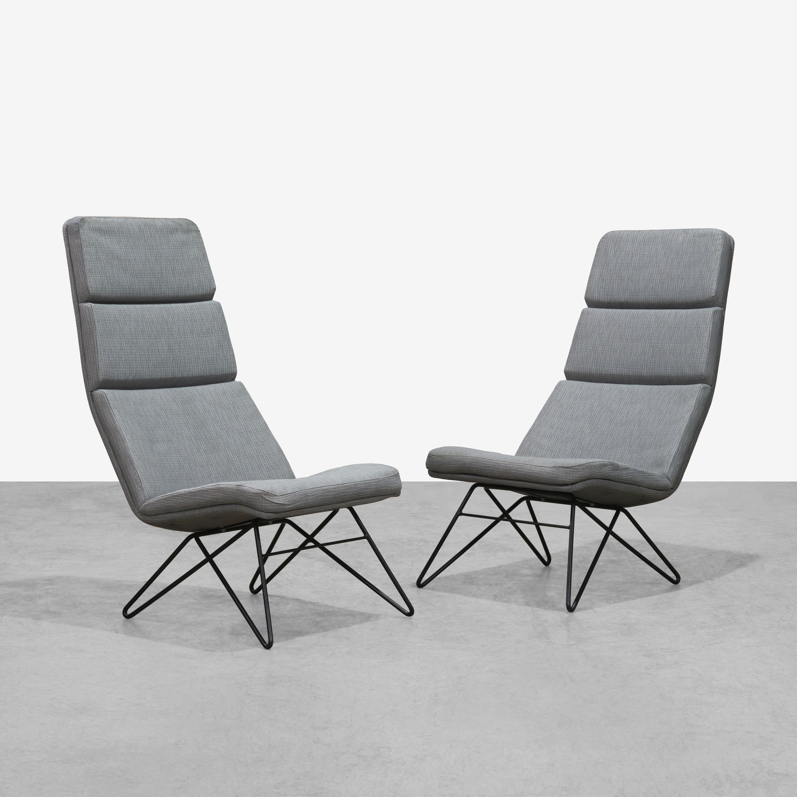 Contemporary Lounge Chairs: A pair of contemporary lounge chairs on hairpin style legs. All measurements are in inches. Height x Width x Depth