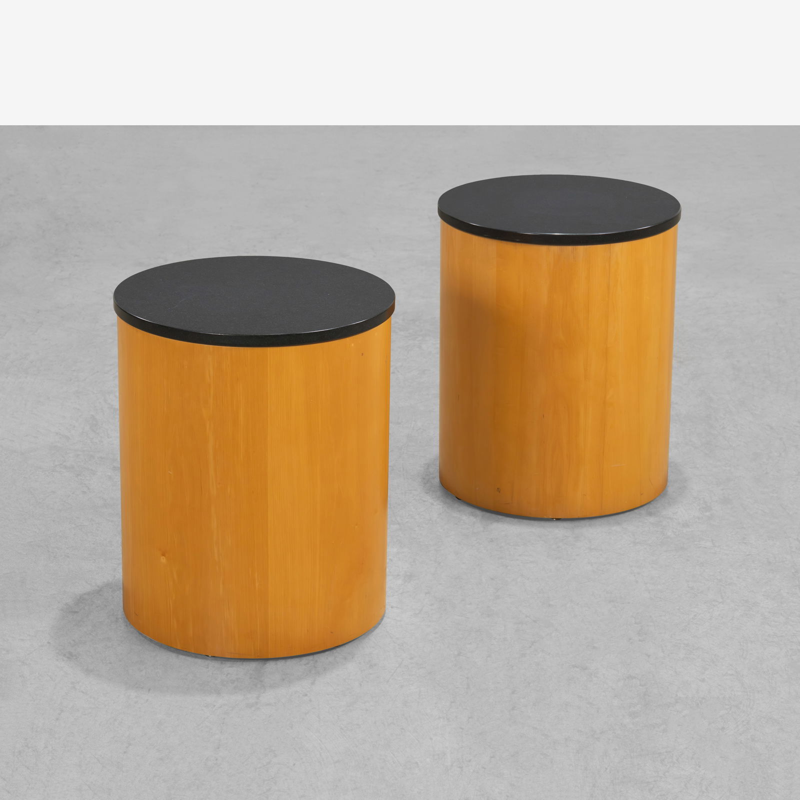 Cylinder Tables: A pair of granite top cylinder tables. All measurements are in inches. Height x Width x Depth