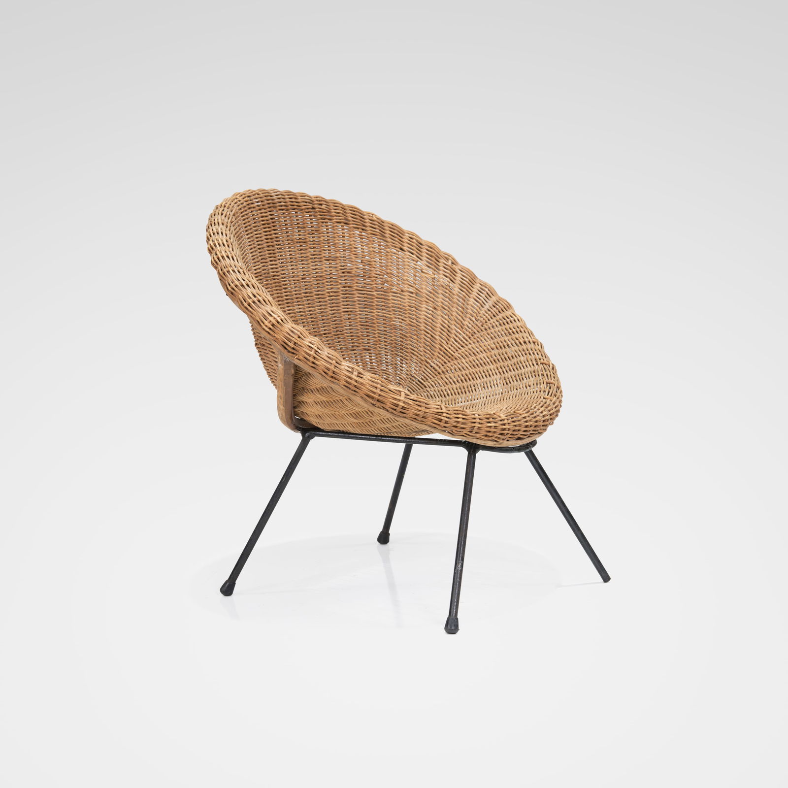 Wicker Child's Chair: An iron and wicker child's chair. All measurements are in inches. Height x Width x Depth