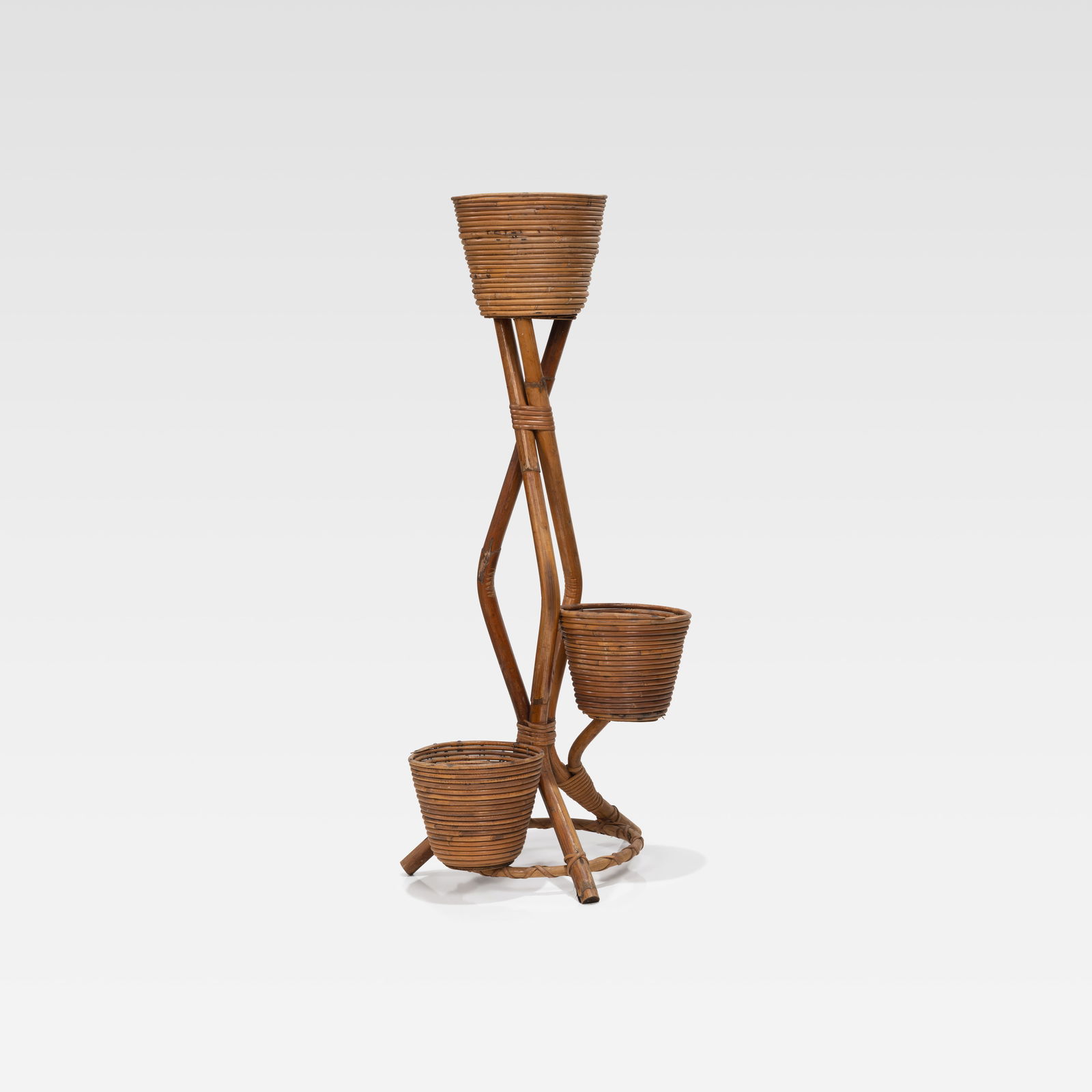 Rattan Plant Stand: A vintage rattan plant stand. All measurements are in inches. Height x Width x Depth