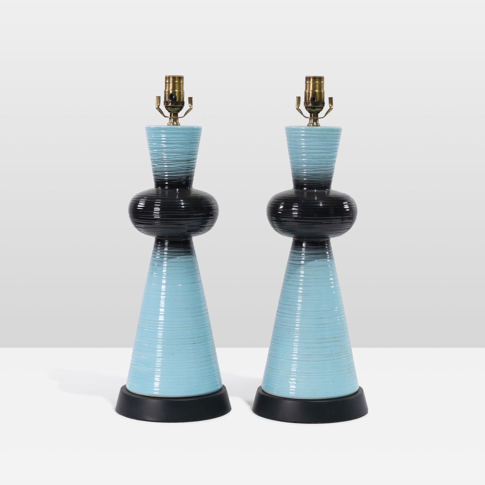 Vintage Ceramic Lamps: A pair of vintage ceramic lamps. All measurements are in inches. Height x Width x Depth