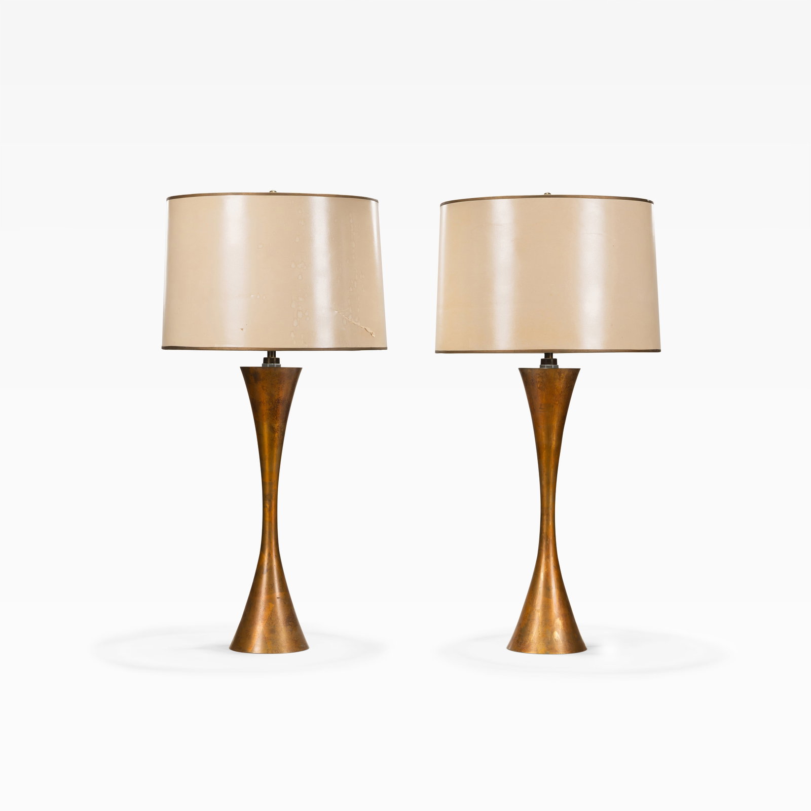 Stewart Ross James - Lamps: A pair of patinated hourglass lamps with ceramic collar switch by Stewart Ross James. All measurements are in inches. Height x Width x Depth