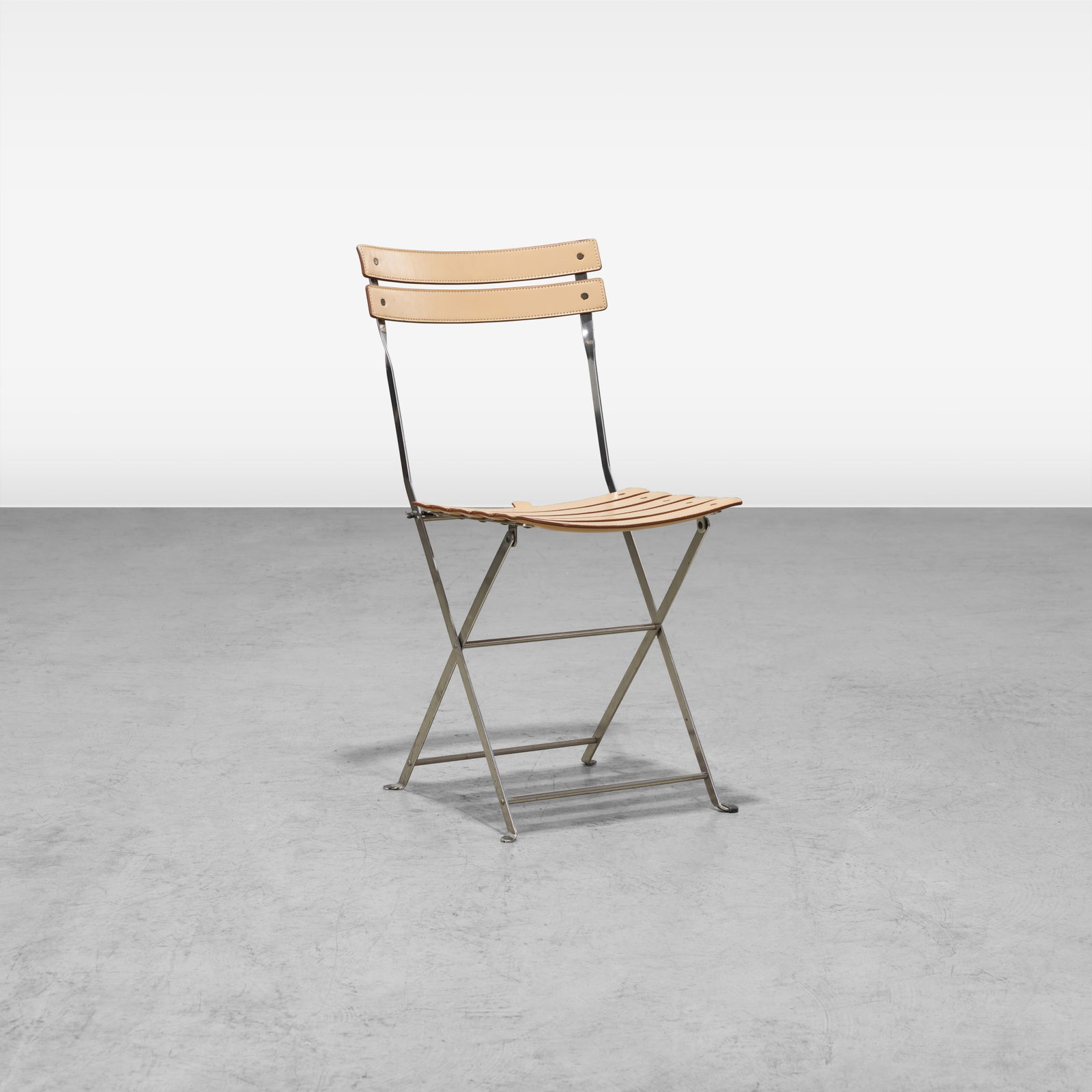 Marco Zanuso - Chair: A leather 'Celestina' folding chair by Marco Zanuso. All measurements are in inches. Height x Width x Depth