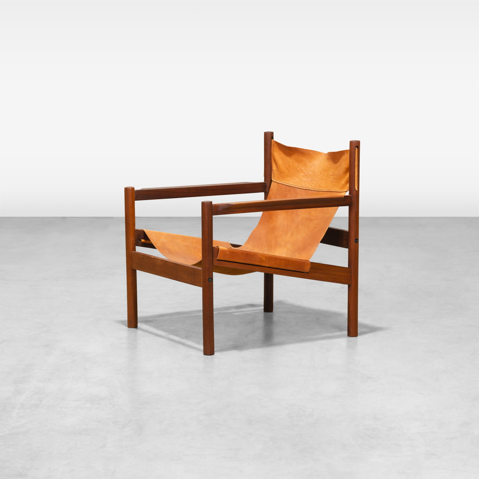 Michel Arnoult - Lounge Chair: A leather sling lounge chair by Michel Arnoult for Roxinho, Brazil. All measurements are in inches. Height x Width x Depth