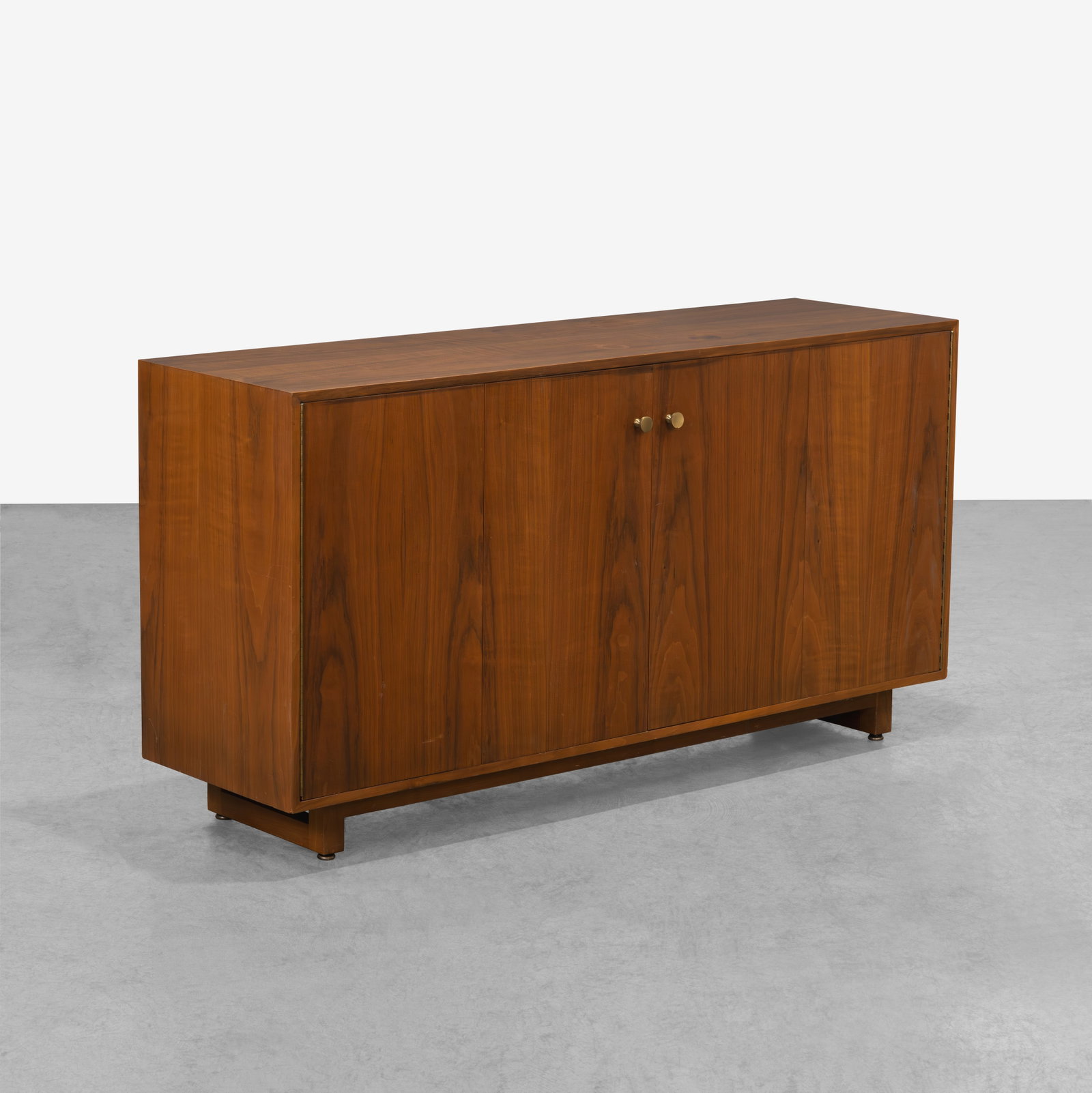 Vladimir Kagan (Attr.) - Sideboard: A walnut sideboard attributed to Vladimir Kagan. All measurements are in inches. Height x Width x Depth