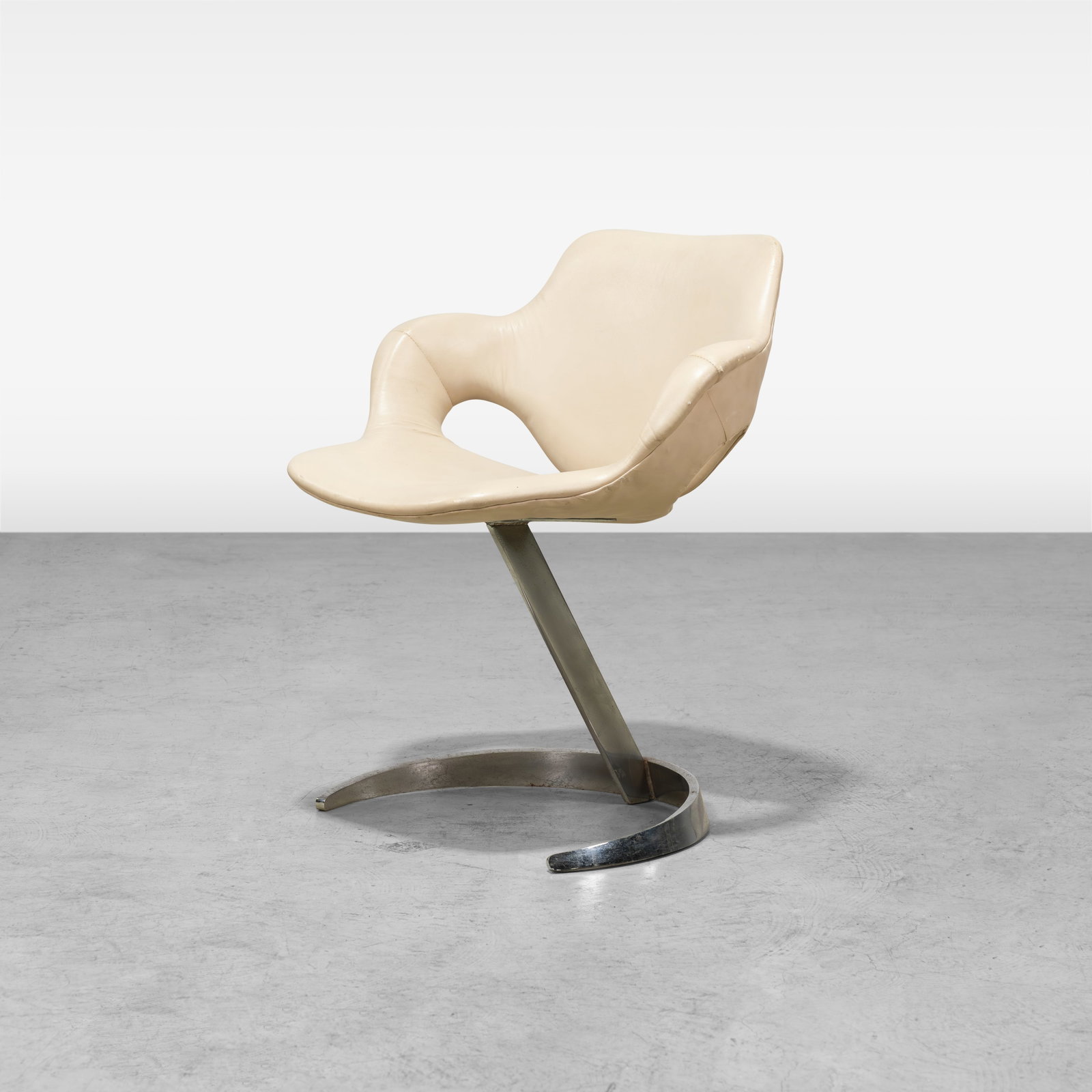 Boris Tabacoff - Chair: A Boris Tabacoff 'Scimitar' chair for MMM, France. All measurements are in inches. Height x Width x Depth