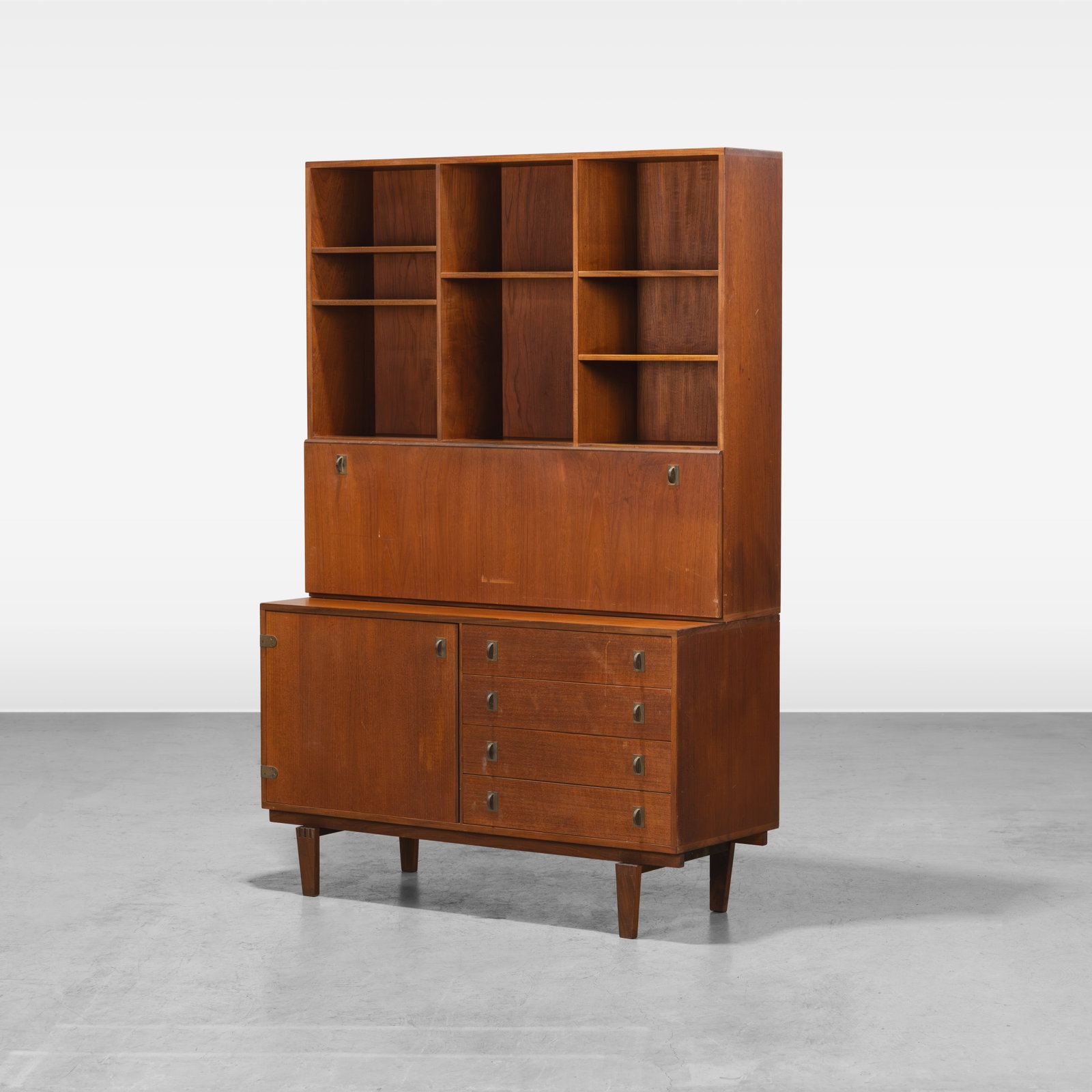 Peter Lovig Nielsen - Cabinet: A vintage teak cabinet with secretary desk top by Peter Lovig Nielsen. All measurements are in inches. Height x Width x Depth