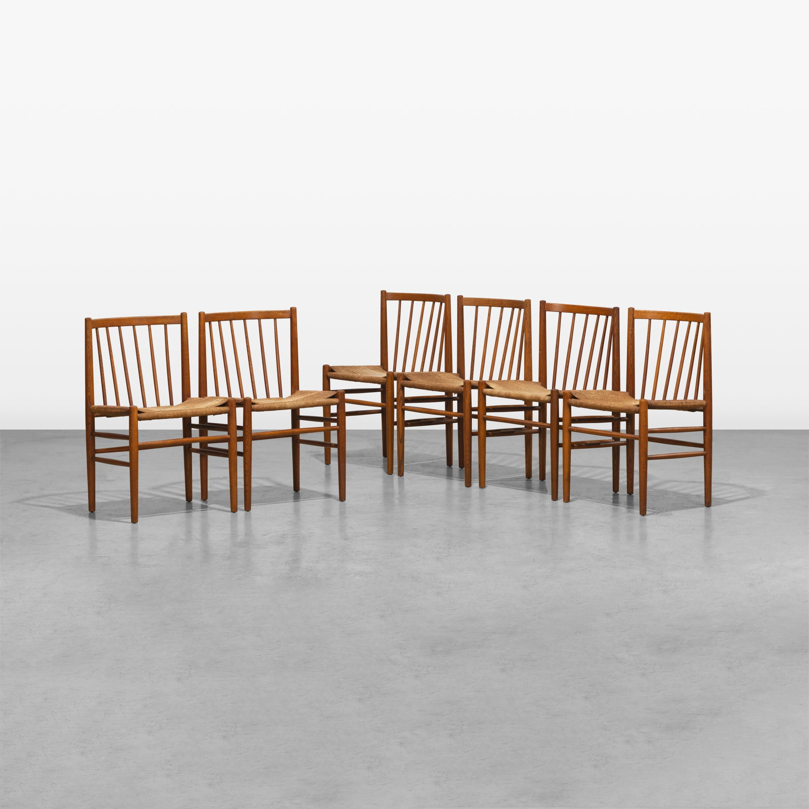 Jorgen Baekmark - Dining Chairs: A seat of six oak and cord seat dining chairs by Jorgen Baekmark. All measurements are in inches. Height x Width x Depth