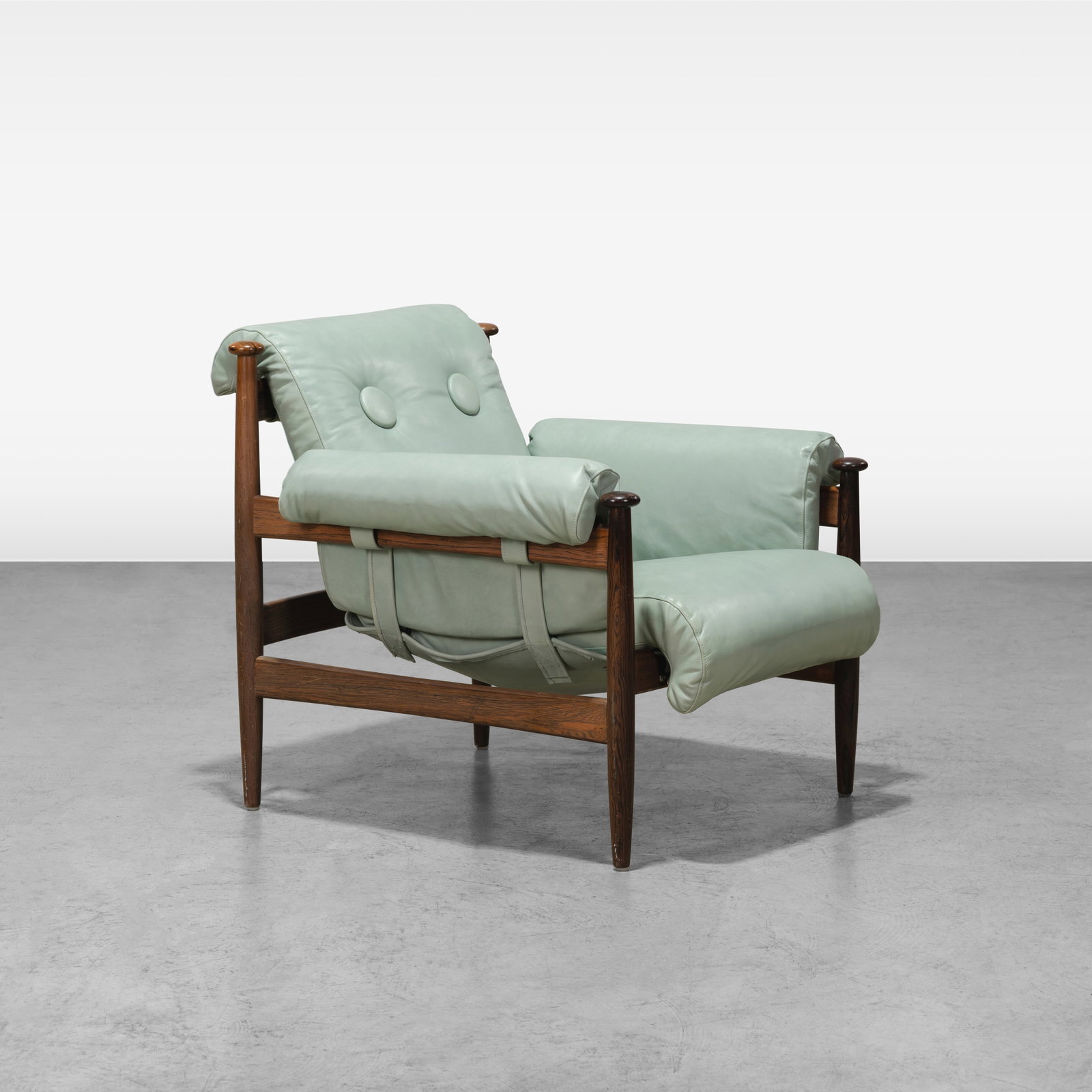 Eric Merthen - Lounge Chair: A rosewood and leather 'Amiral' lounge chair by Eric Merthen. All measurements are in inches. Height x Width x Depth