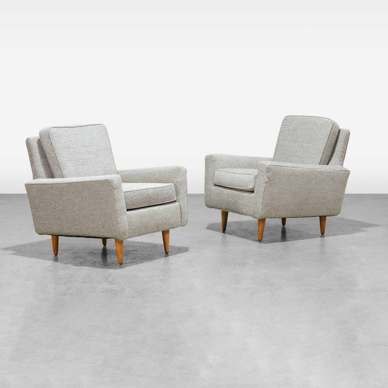 Florence Knoll - Lounge Chairs: A pair of lounge chairs by Florence Knoll. All measurements are in inches. Height x Width x Depth