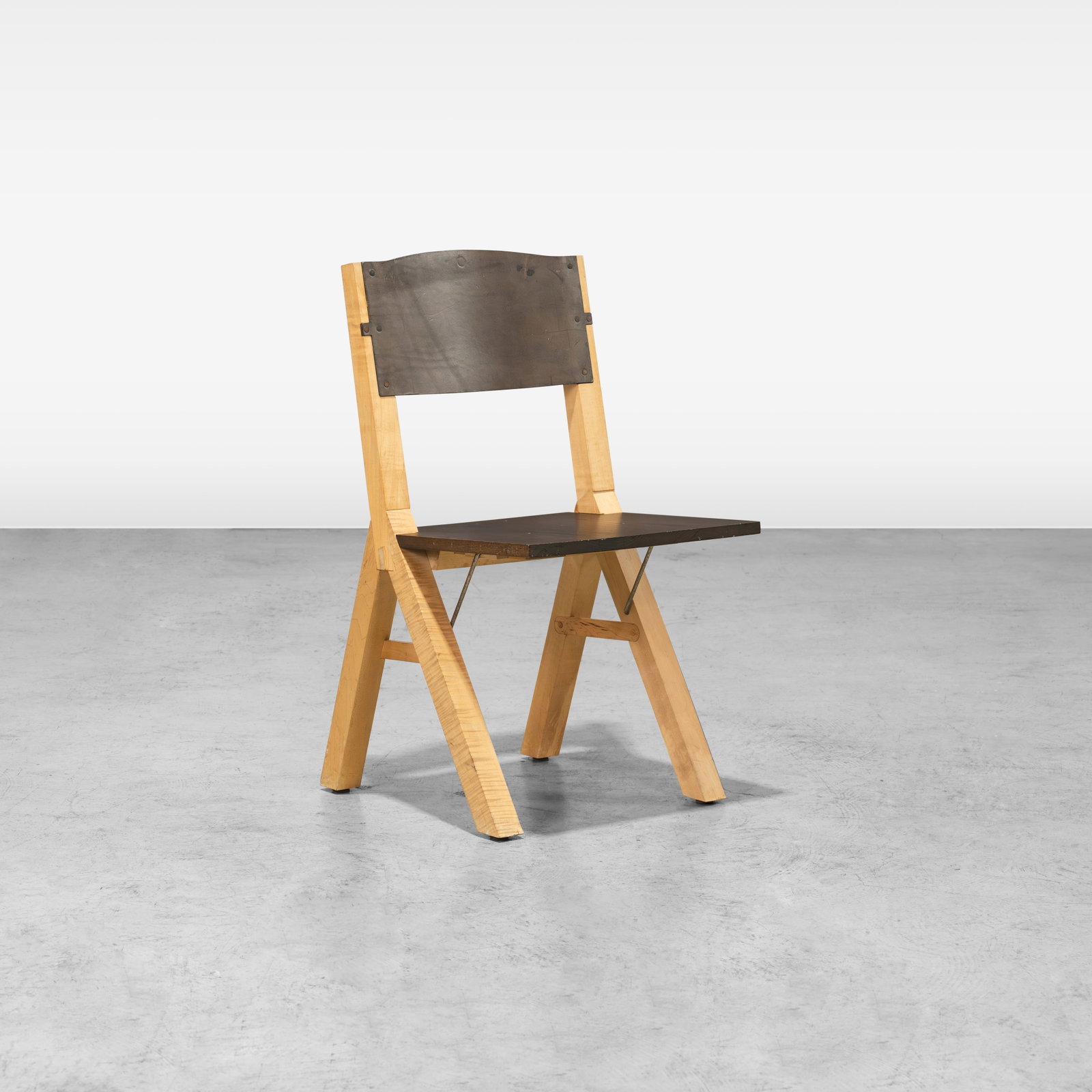 Tyler Hays - Chair: A mixed wood and leather side chair by Tyler Hays for BBDW. Stamped on bottom with previous original auction date, '6/3/2014'. All measurements are in inches. Height x Width x Depth