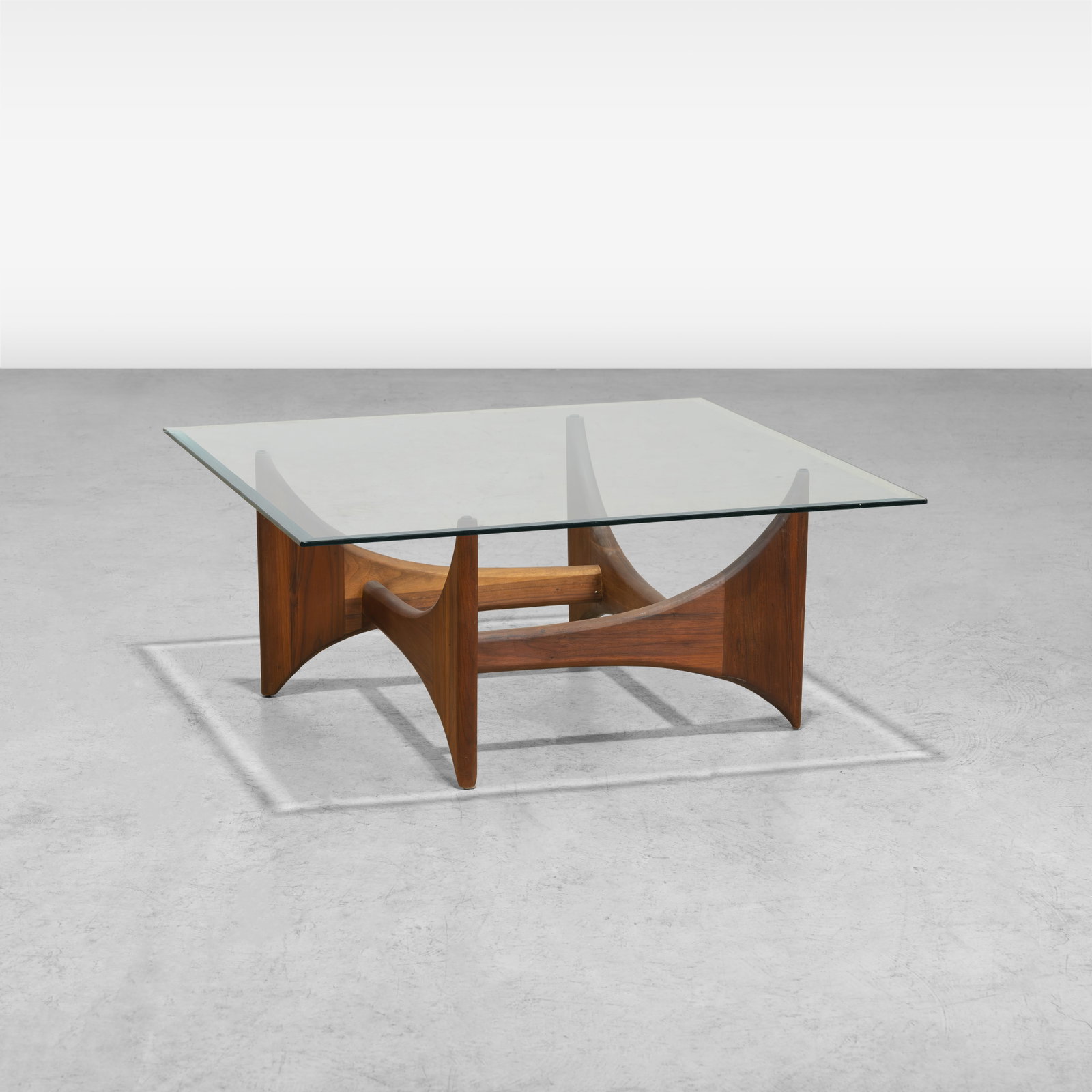 Adrian Pearsall - Coffee Table: A walnut coffee table with beveled glass top by Adrian Pearsall. All measurements are in inches. Height x Width x Depth