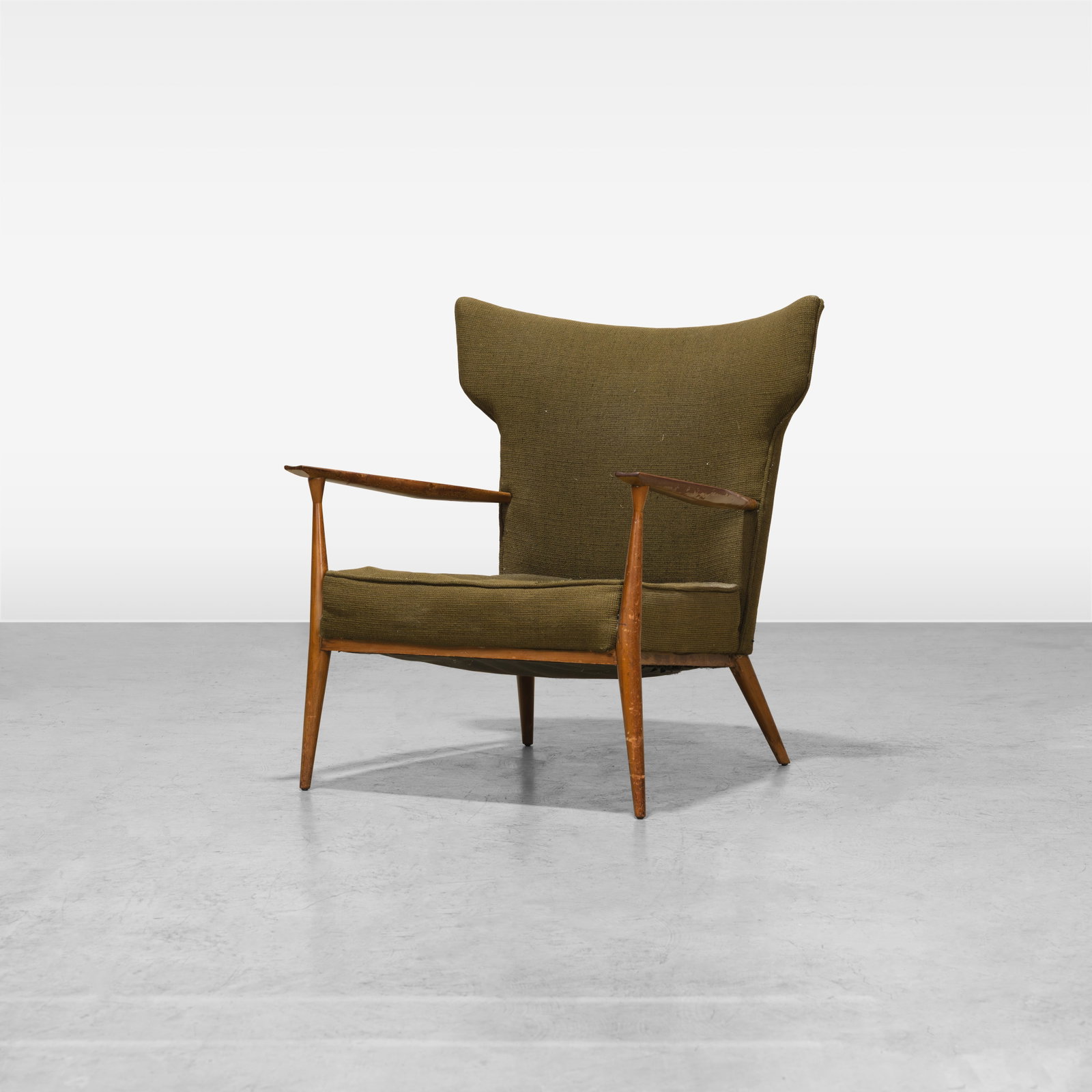 Paul McCobb - Lounge Chair: A 'Model 1321' walnut lounge chair by Paul McCobb for Directional. All measurements are in inches. Height x Width x Depth