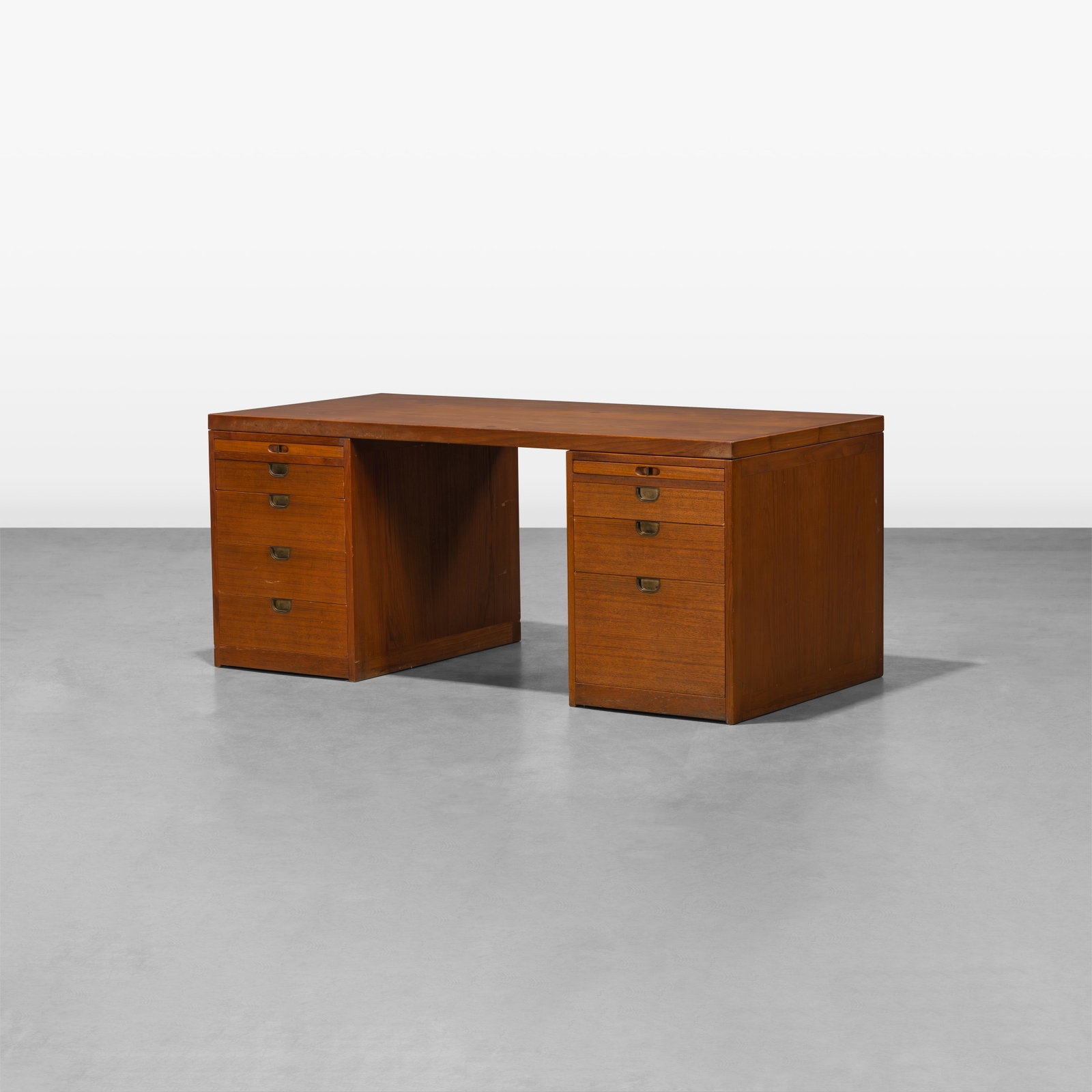 Borge Mogensen - Desk: A three-part teak campaign style pedestal desk with a pull-out table and brass hardware by Borge Mogensen. All measurements are in inches. Height x Width x Depth