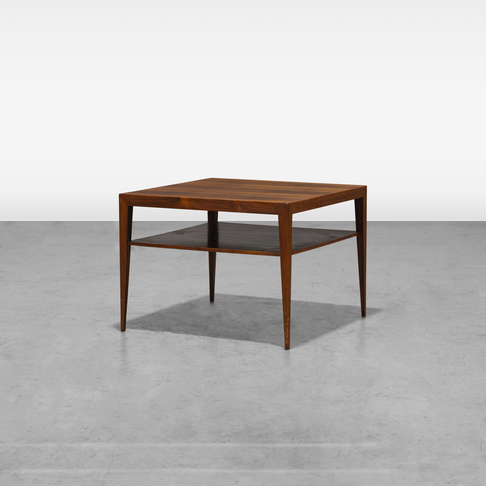 Severin Hansen - Coffee Table: A two-tier rosewood coffee table by Severin Hansen. All measurements are in inches. Height x Width x Depth