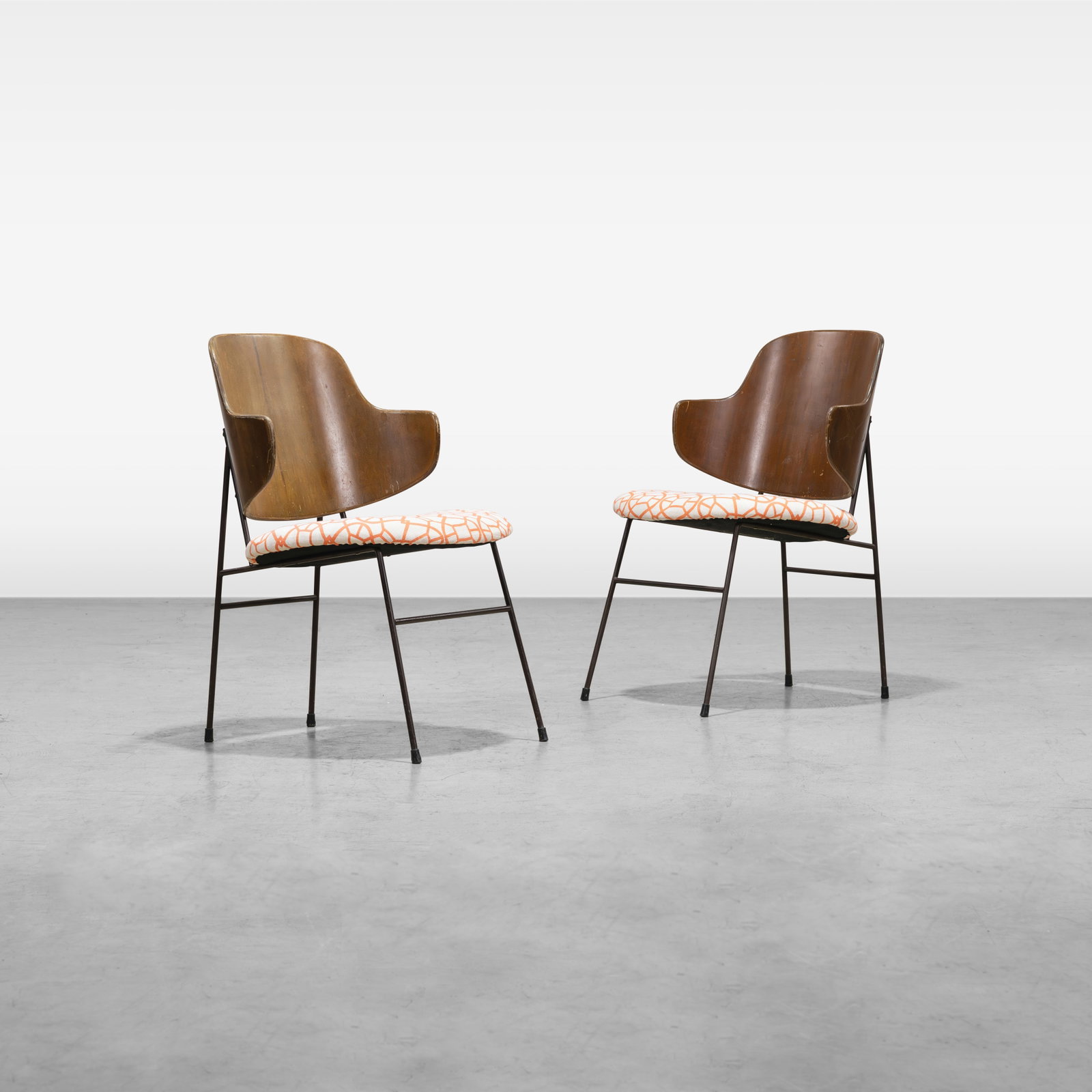 Ib Kofod-Larsen - Chairs: A pair of 'Penguin' chairs by Ib Kofod-Larsen. All measurements are in inches. Height x Width x Depth