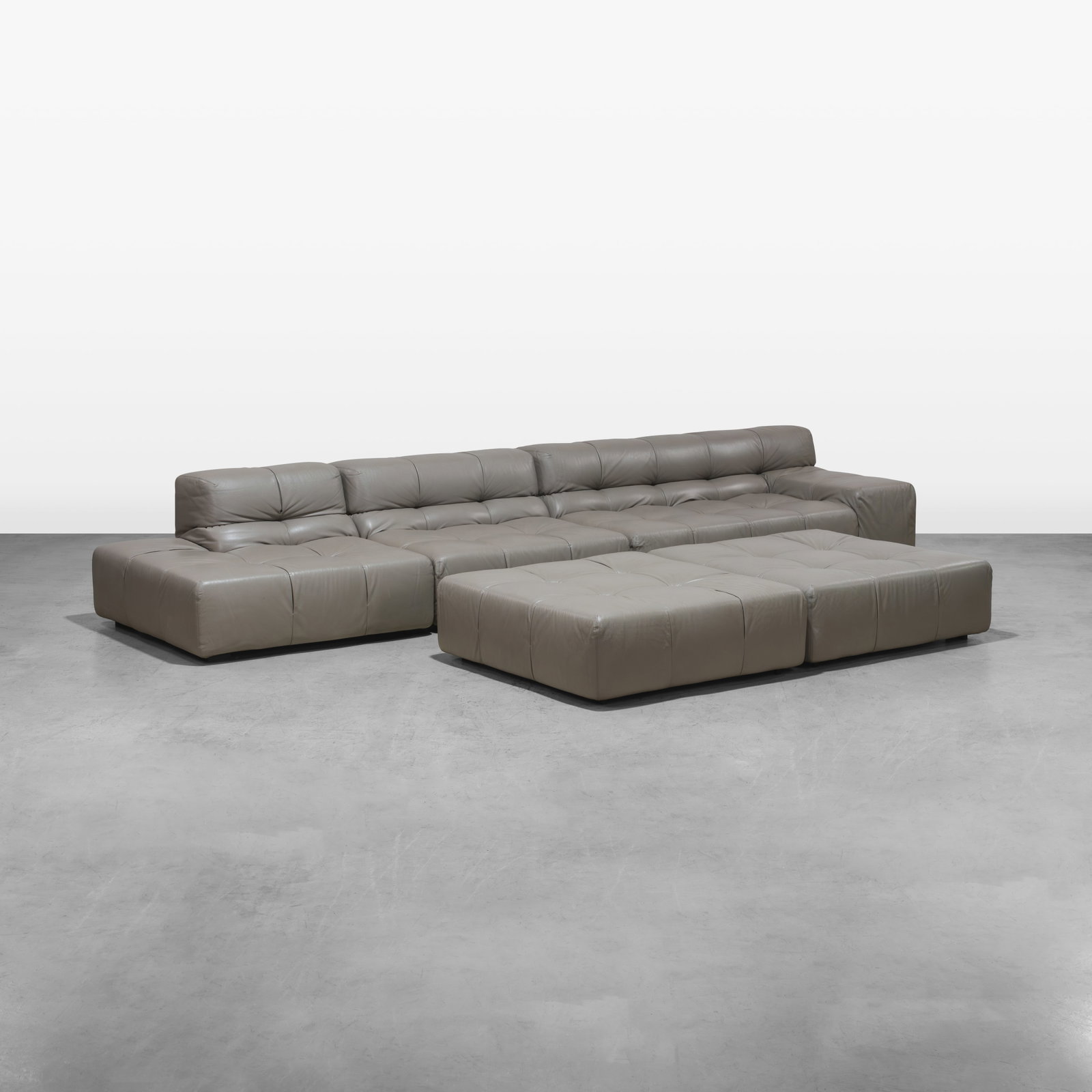 Patricia Urquiola - Tufty Time Sectional Sofa: A leather 'Tufty Time' sectional sofa by Patricia Urquiola. Dimensions listed are for the three sections, as pictured. Longest section length - 69.5, middle segment length - 40, end section length - 4