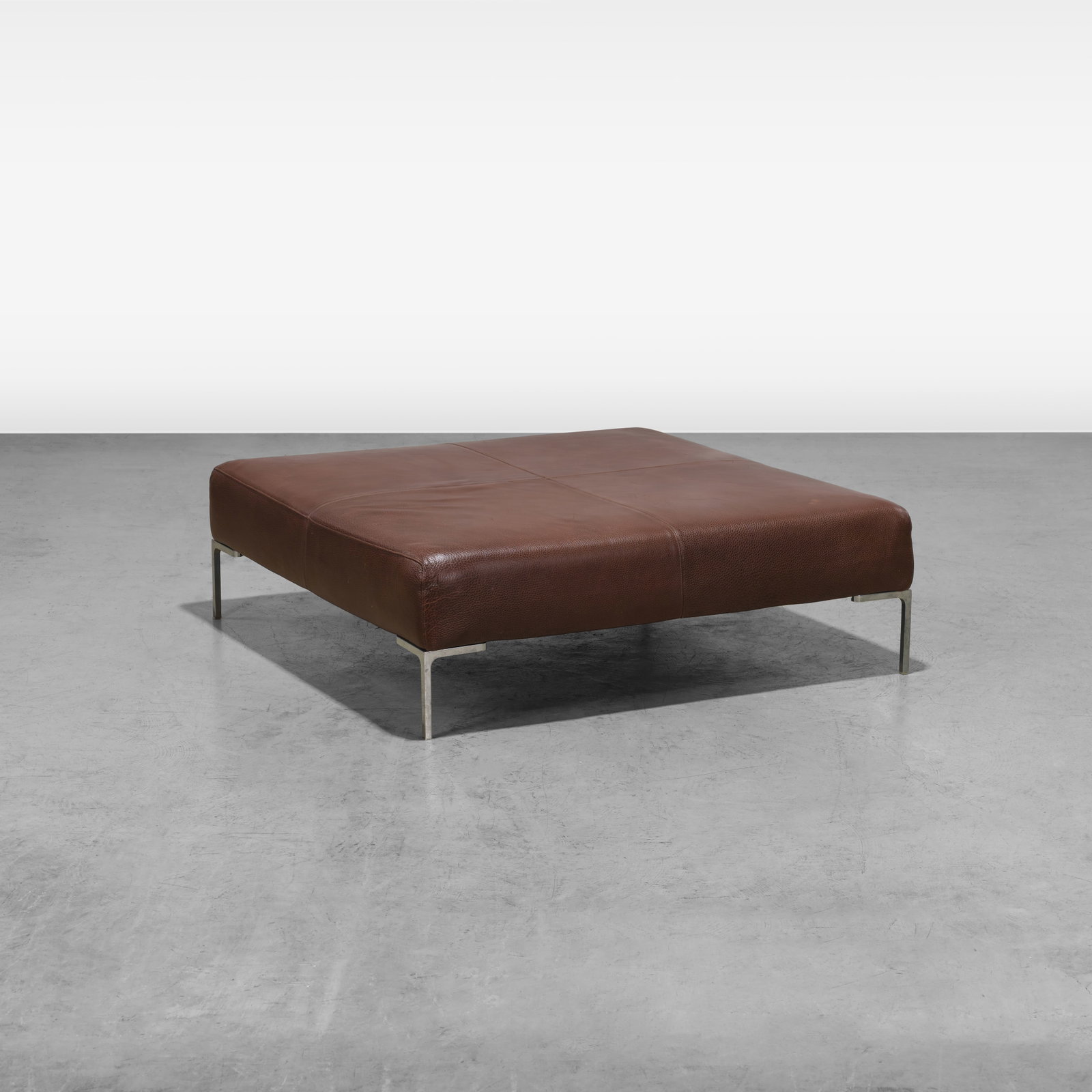 Antonio Citterio - Leather Ottoman: An oversized leather 'Charles' ottoman by Antonio Citterio for B&B Italia. All measurements are in inches. Height x Width x Depth