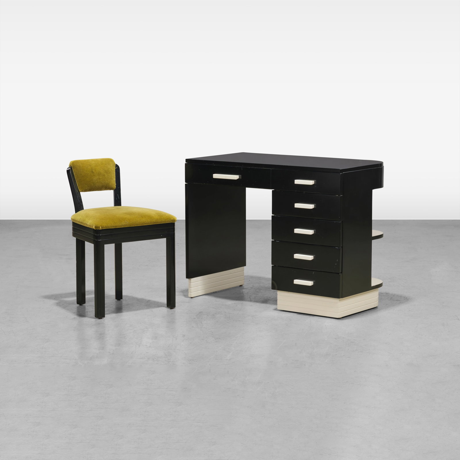 Art Deco Desk & Chair: A vintage desk with matching chair, upholstered in green mohair. Dimensions listed are for the desk. Chair - 29.5 x 19 x 18.5. All measurements are in inches. Height x Width x Depth