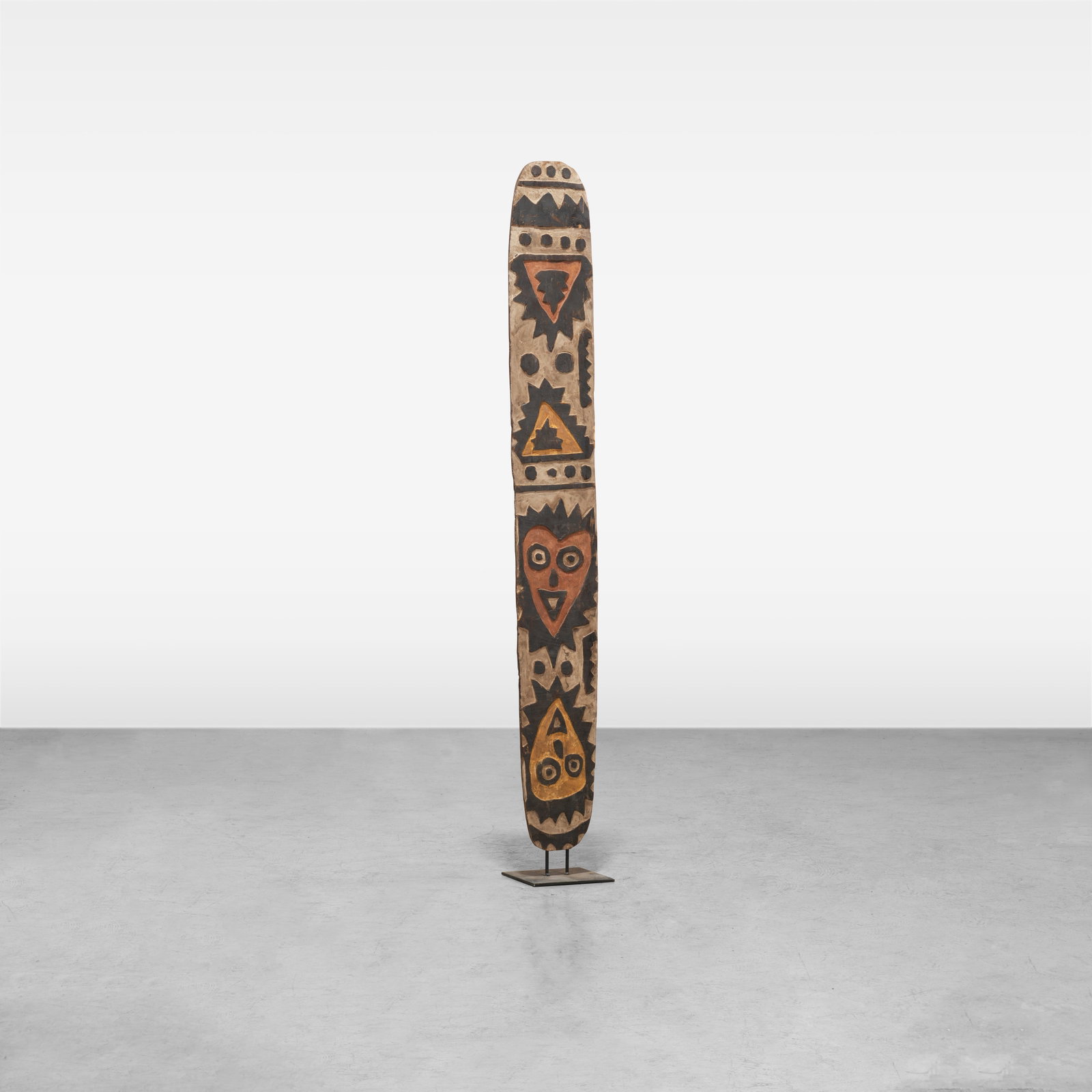 Polynesian Wood Carving: A large Polynesian wooden carving on metal base All measurements are in inches. Height x Width x Depth