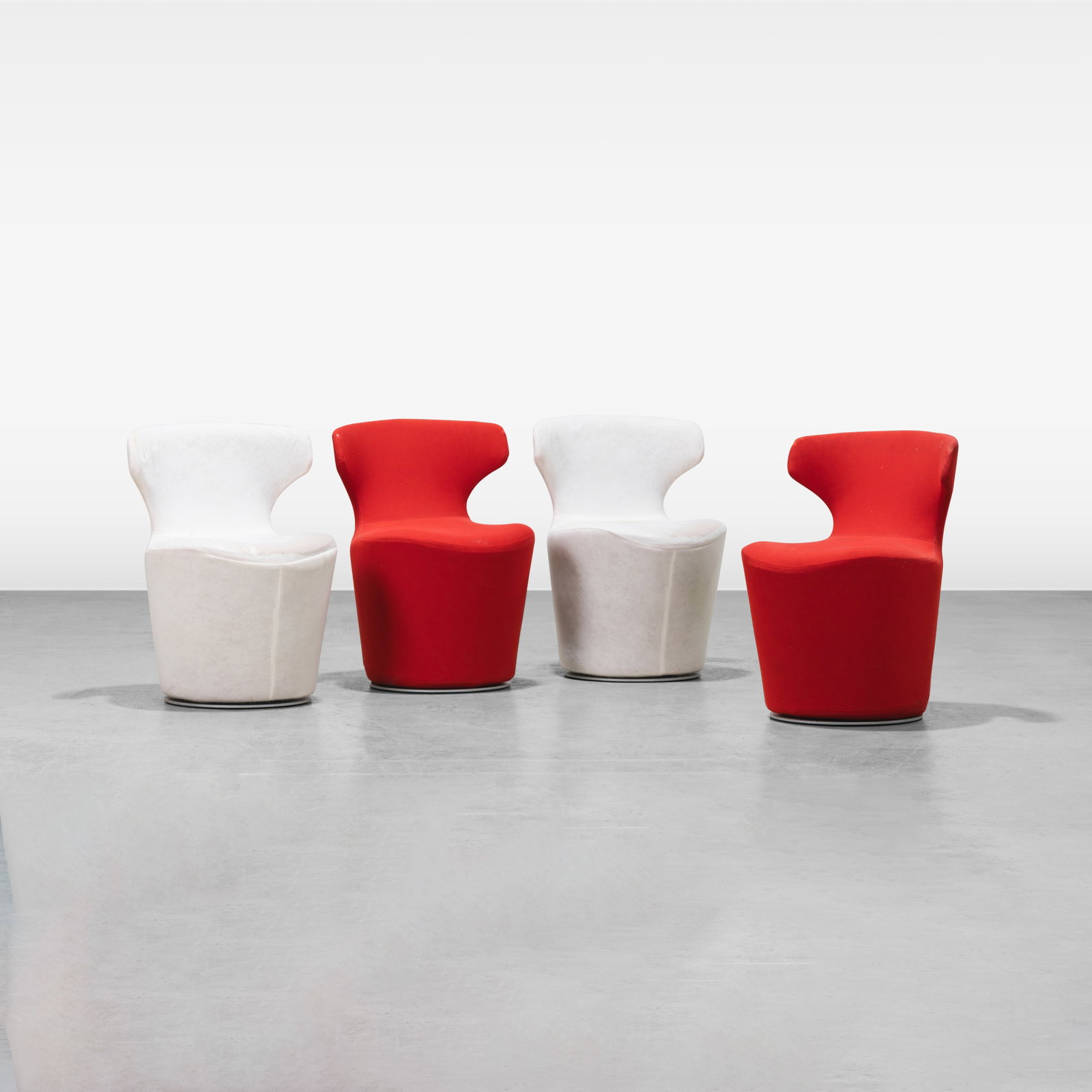 Naoto Fukasawa - Chairs: A set of four swiveling 'Mini Papilio' chairs by Naoto Fukasawa for B&B Italia. All measurements are in inches. Height x Width x Depth