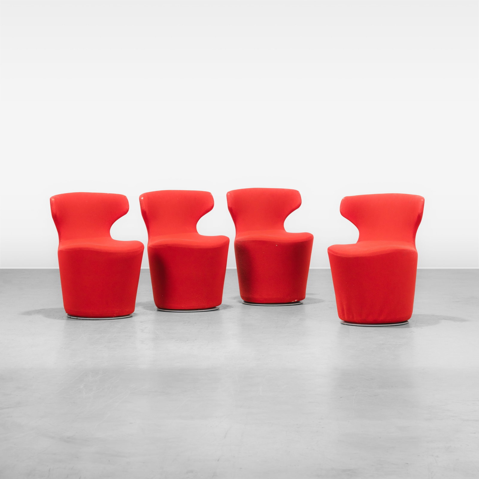 Naoto Fukasawa - Chairs: A set of four swiveling 'Mini Papilio' chairs by Naoto Fukasawa for B&B Italia. All measurements are in inches. Height x Width x Depth