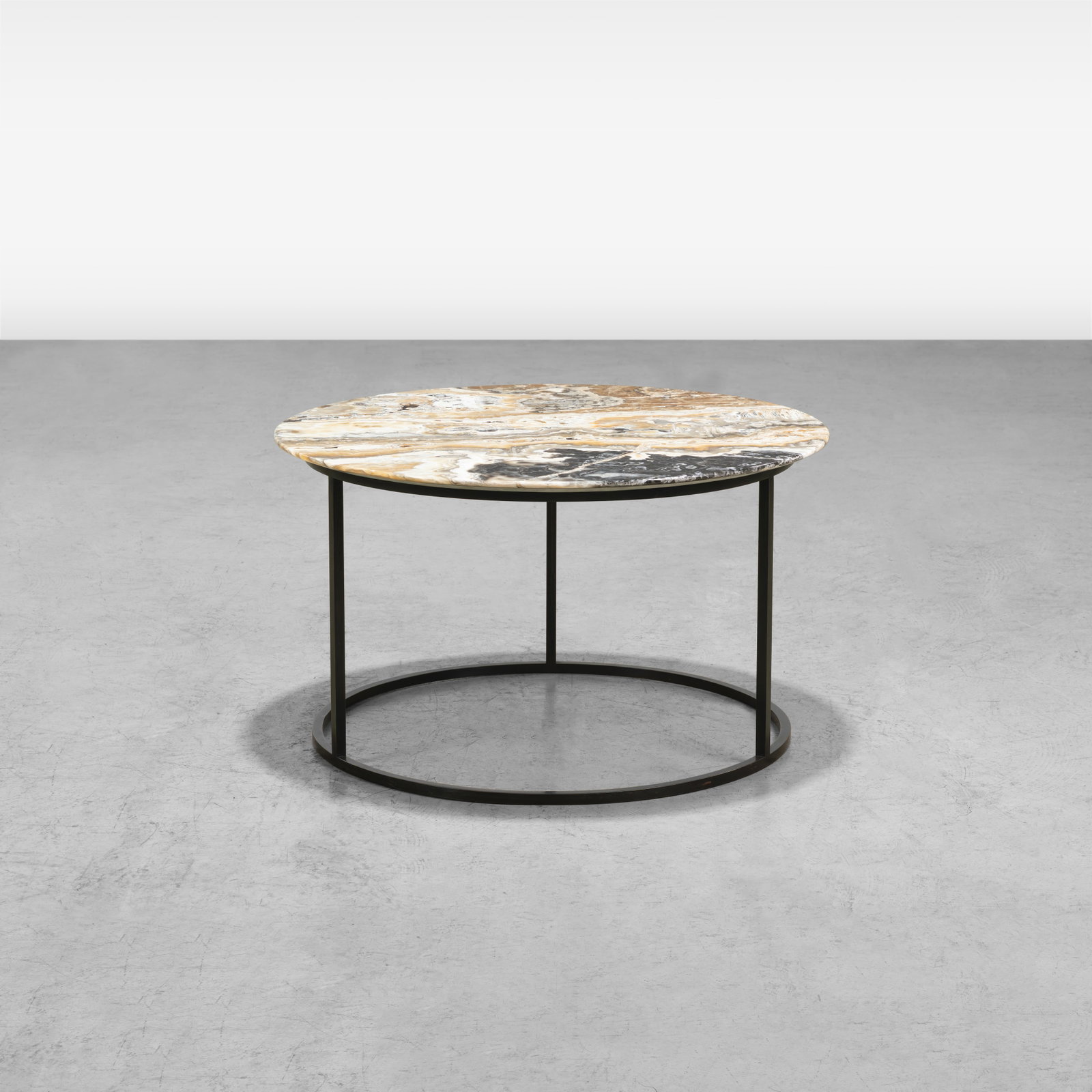 Italian Occasional Table: An Italian occasional table with beveled onyx top and metal base. Previously sold at Christie's from the estate of Amy Perlin. All measurements are in inches. Height x Width x Depth