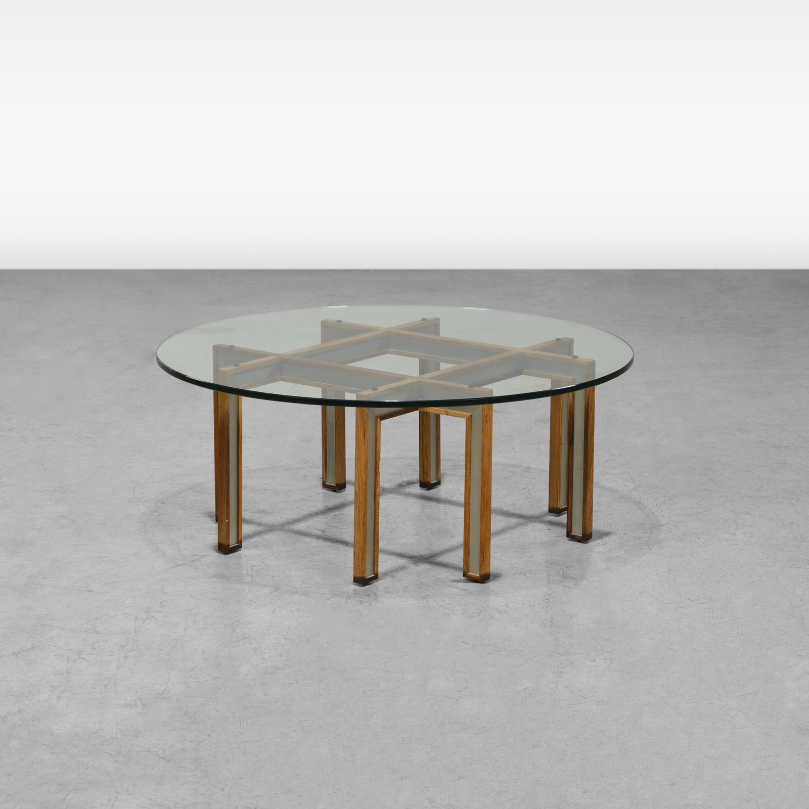 Rosewood Coffee Table: A rosewood, aluminum, and glass coffee table. All measurements are in inches. Height x Width x Depth