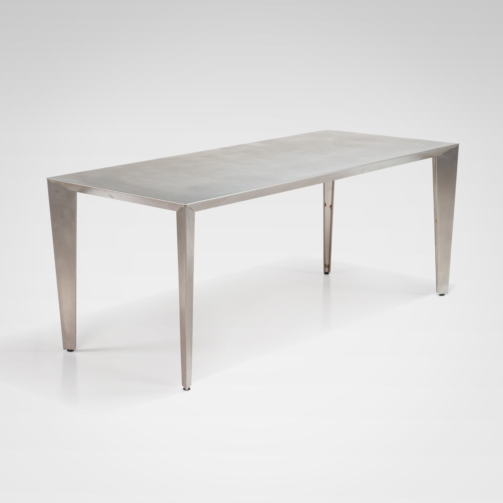 Metal Dining Table: A metal dining table by Forms + Surfaces. All measurements are in inches. Height x Width x Depth