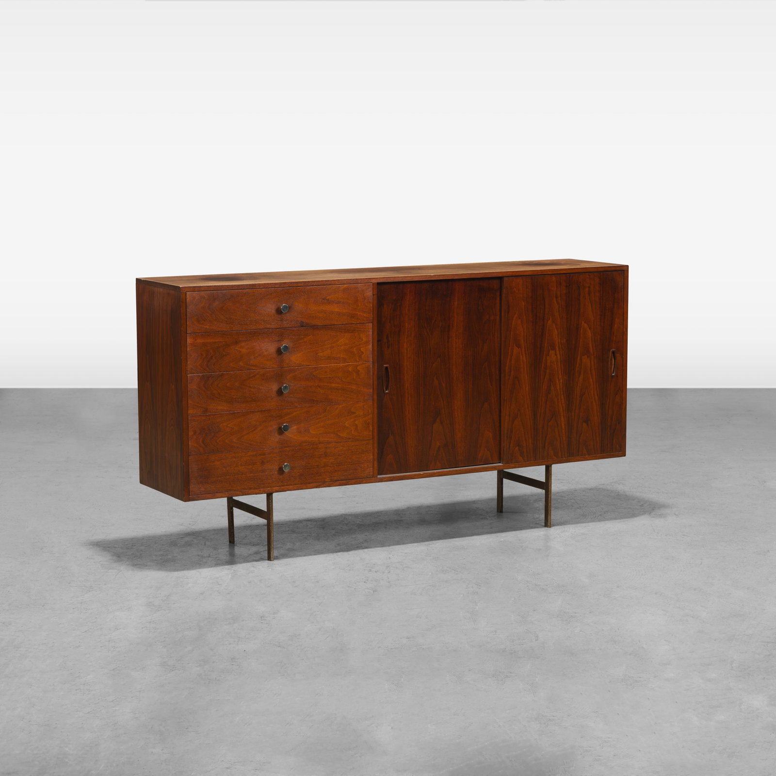 Walnut Credenza: Finished back, metal legs, adjustable shelf All measurements are in inches. Height x Width x Depth