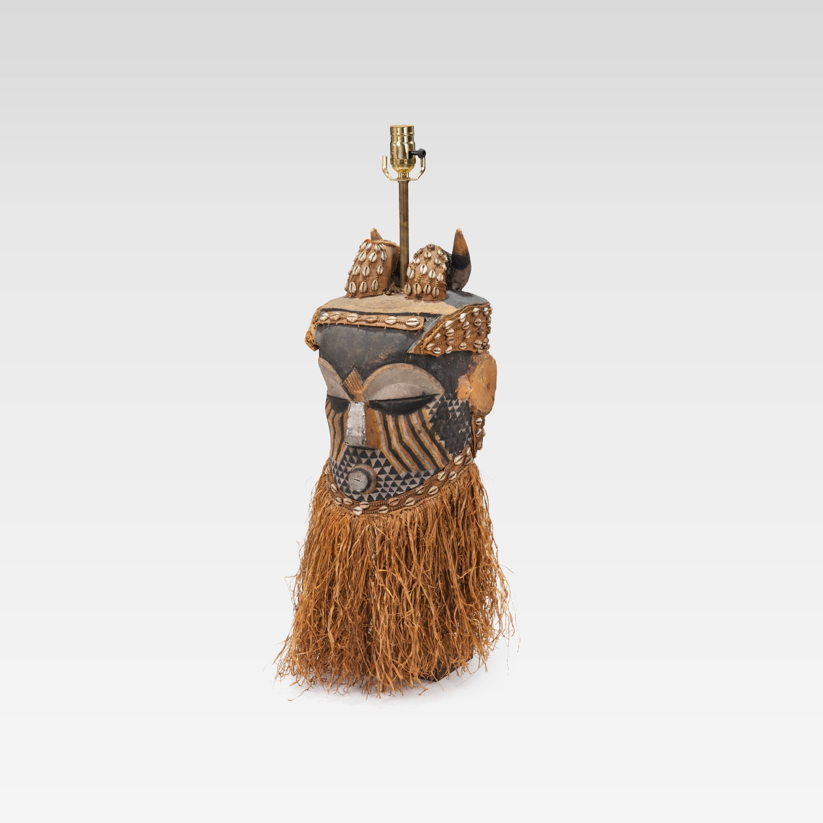 African Mask Lamp: A vintage African mask lamp. All measurements are in inches. Height x Width x Depth