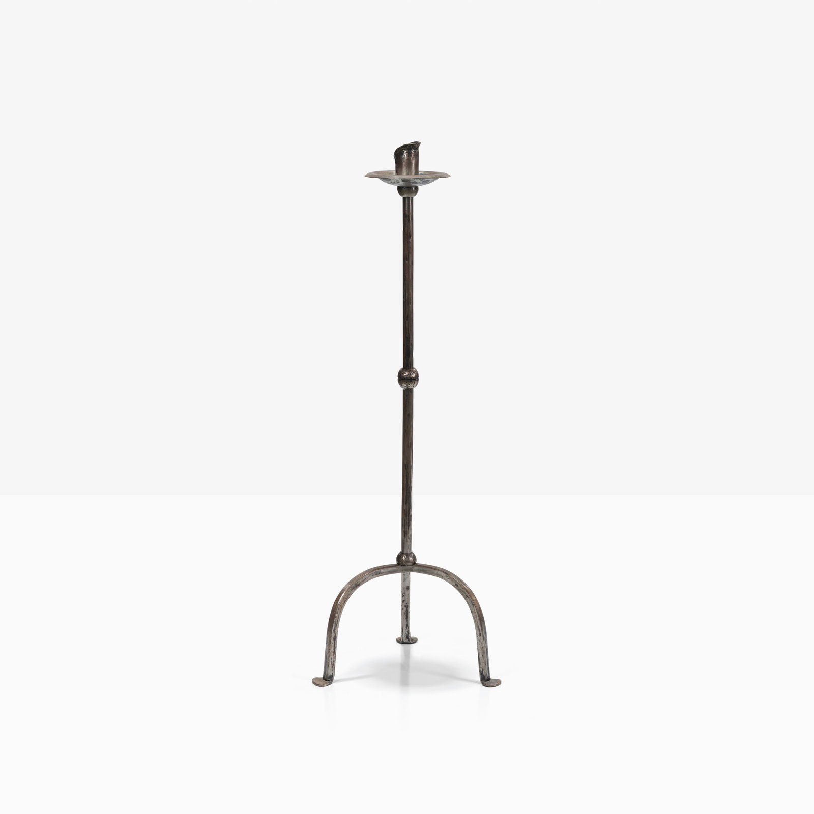 Wrought Iron Candle Holder: A wrought iron candle holder. All measurements are in inches. Height x Width x Depth