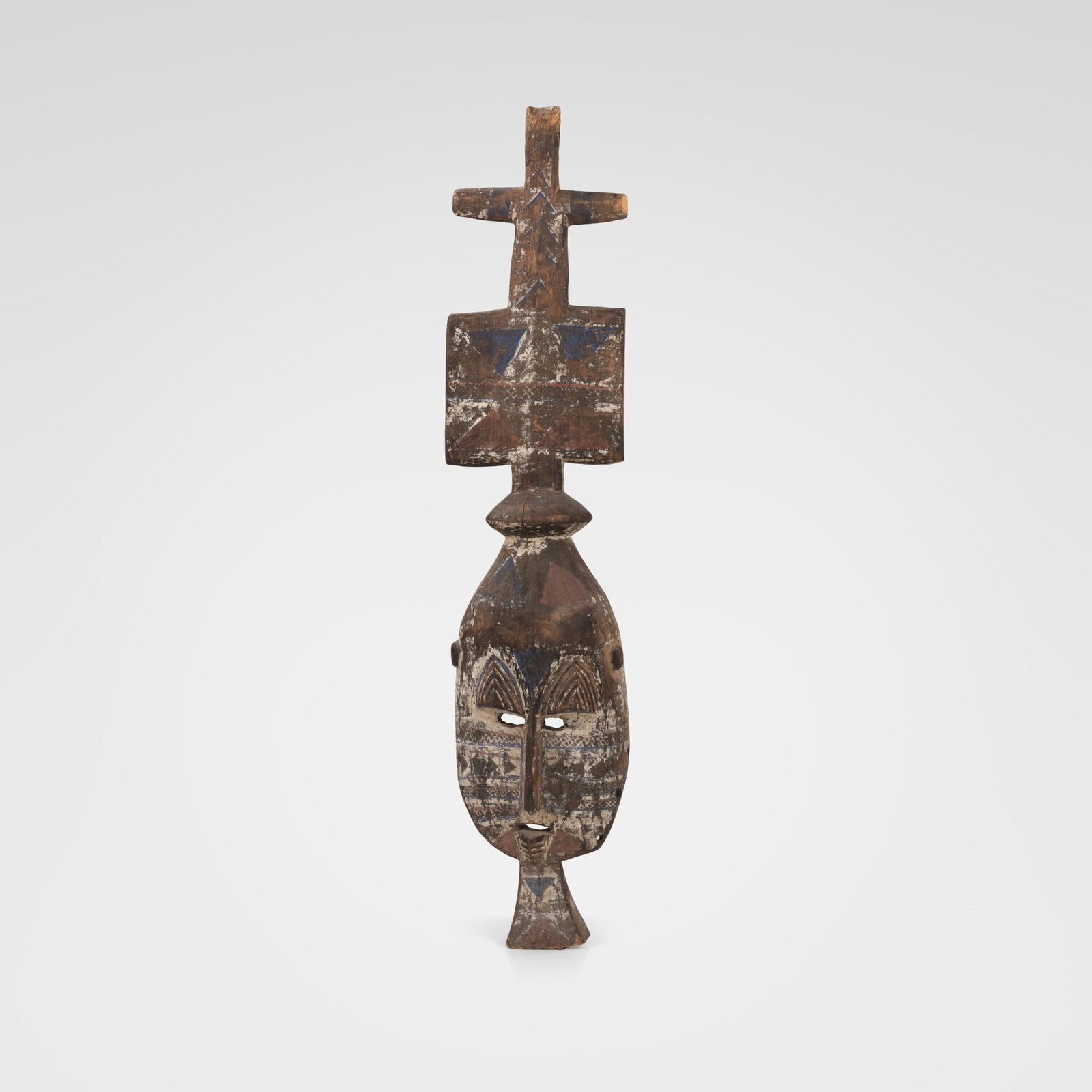Dogon Mask: A Dogon 'Kanaga' mask from Western Africa. All measurements are in inches. Height x Width x Depth